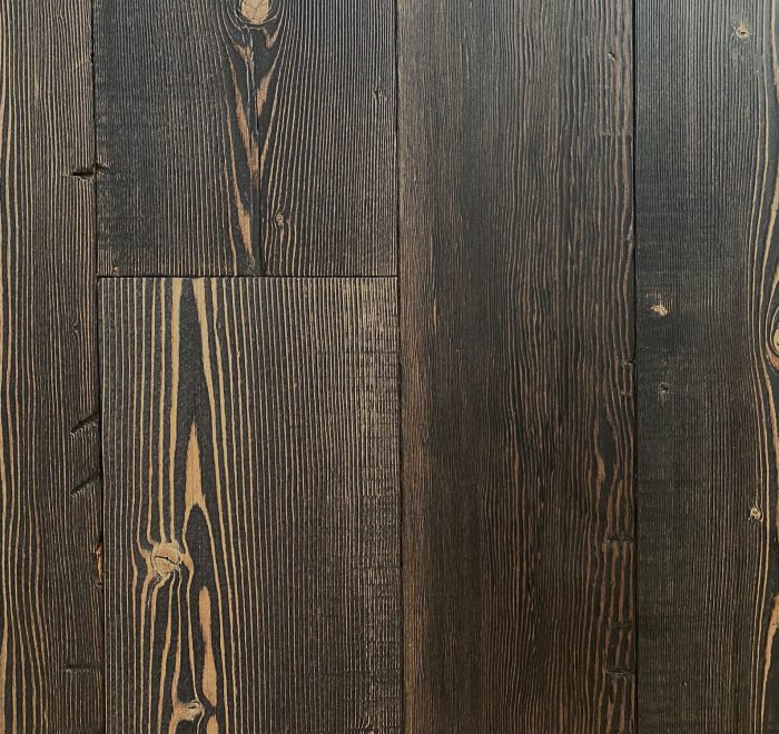 Black reclaimed floor boards