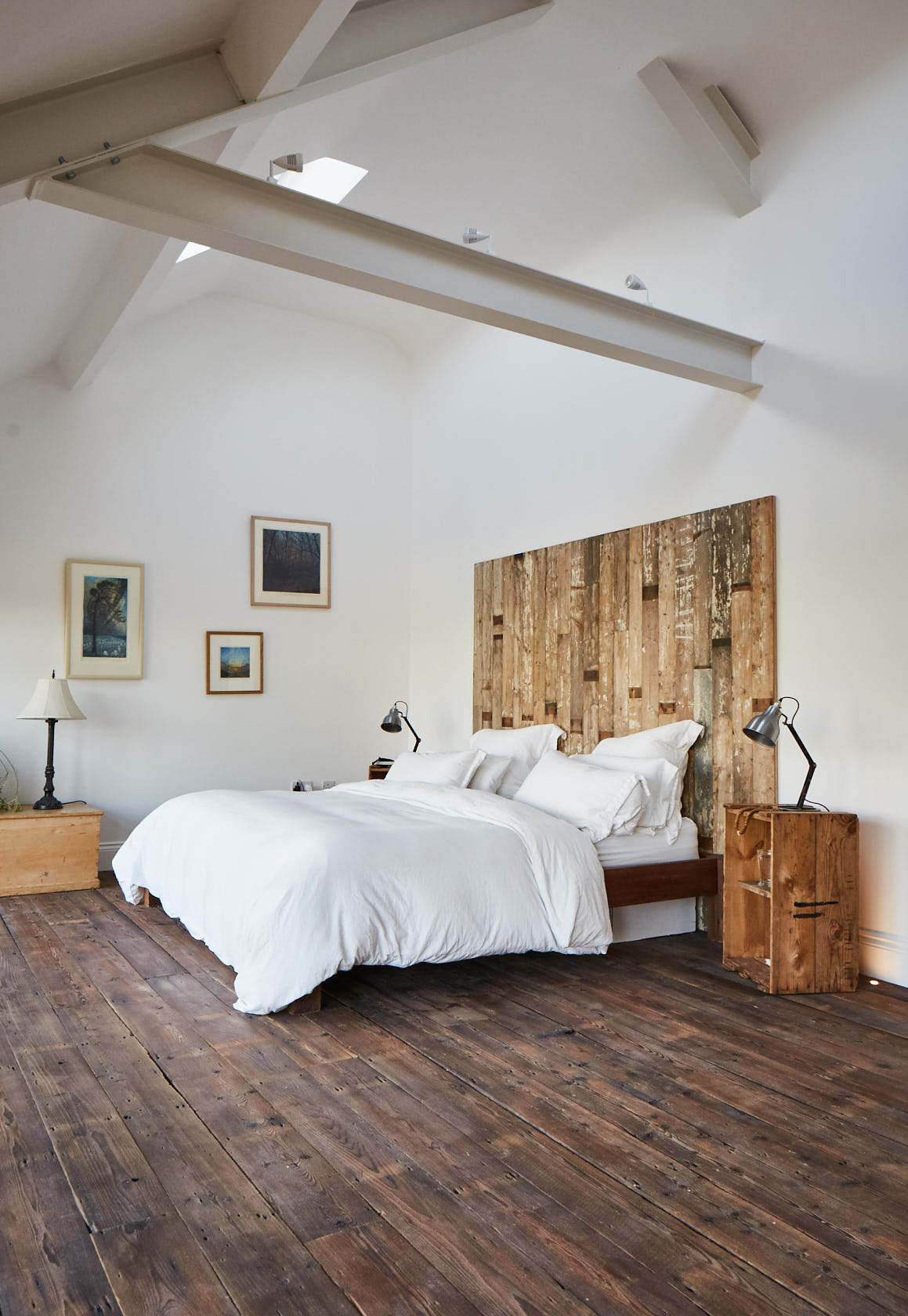 White double bed with reclaimed head board