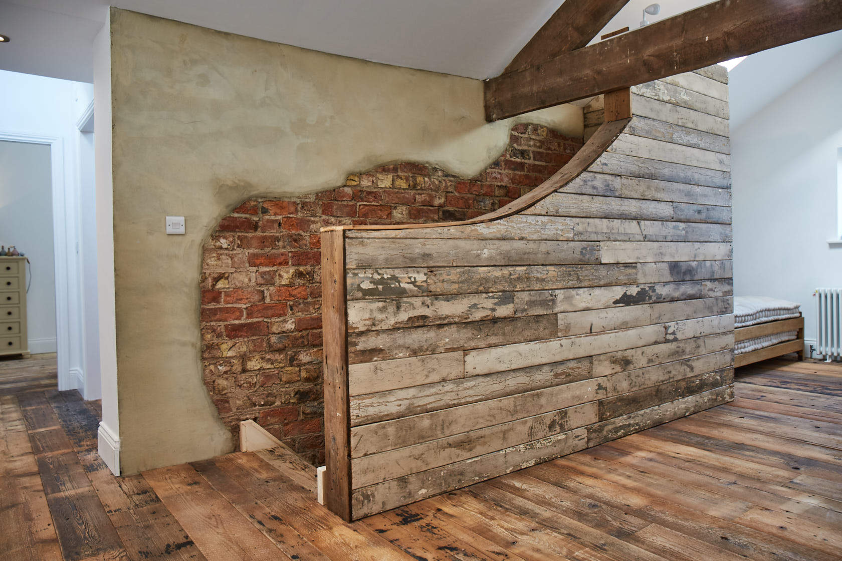 Flaky white cladding on stairwell