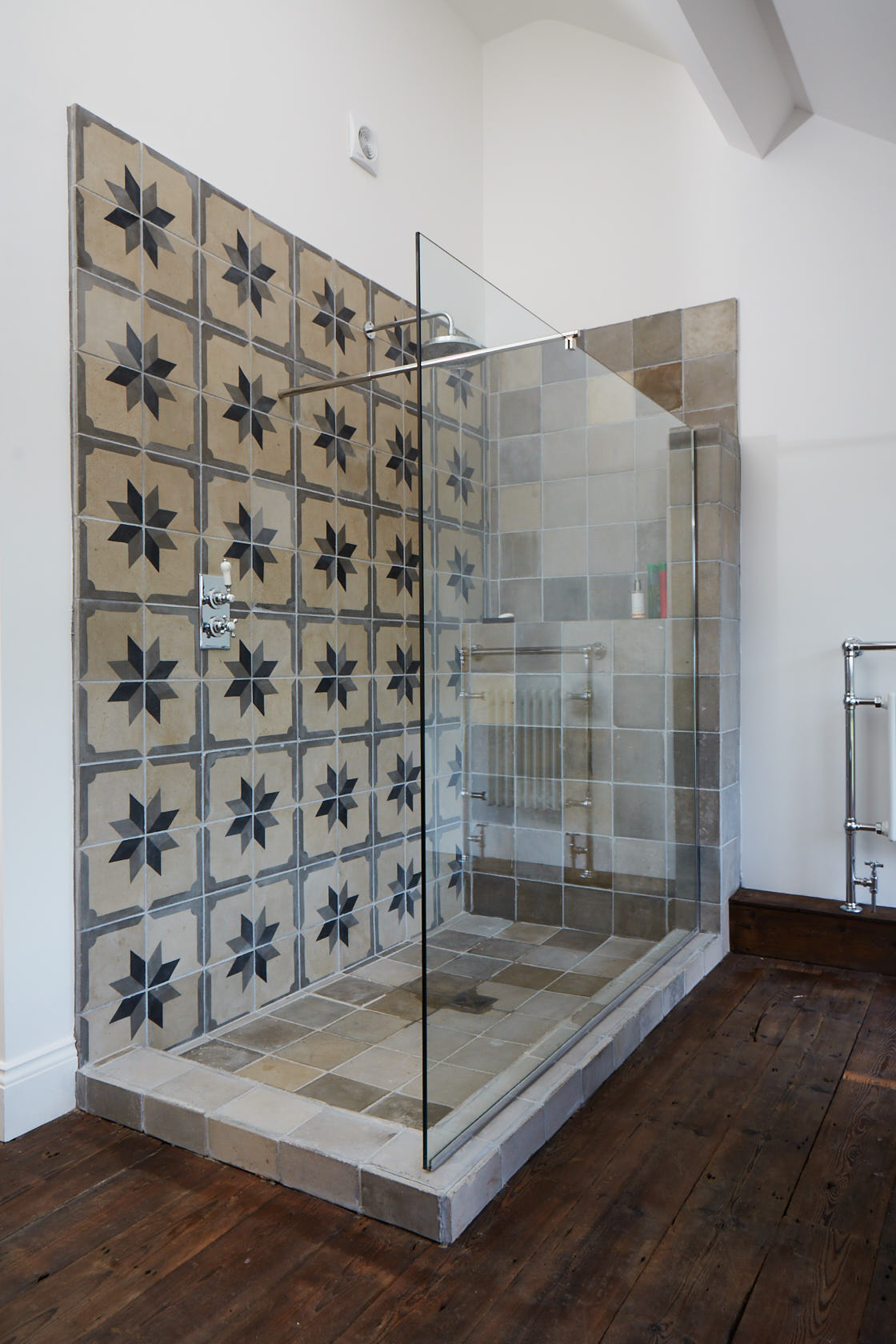 Tiled shower with concrete base