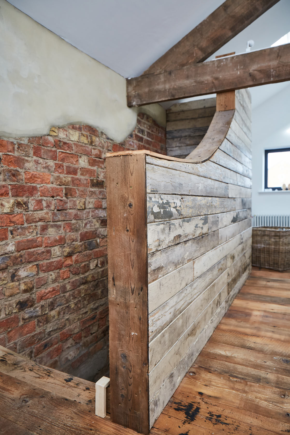 Reclaimed white flaky cladding on stairs