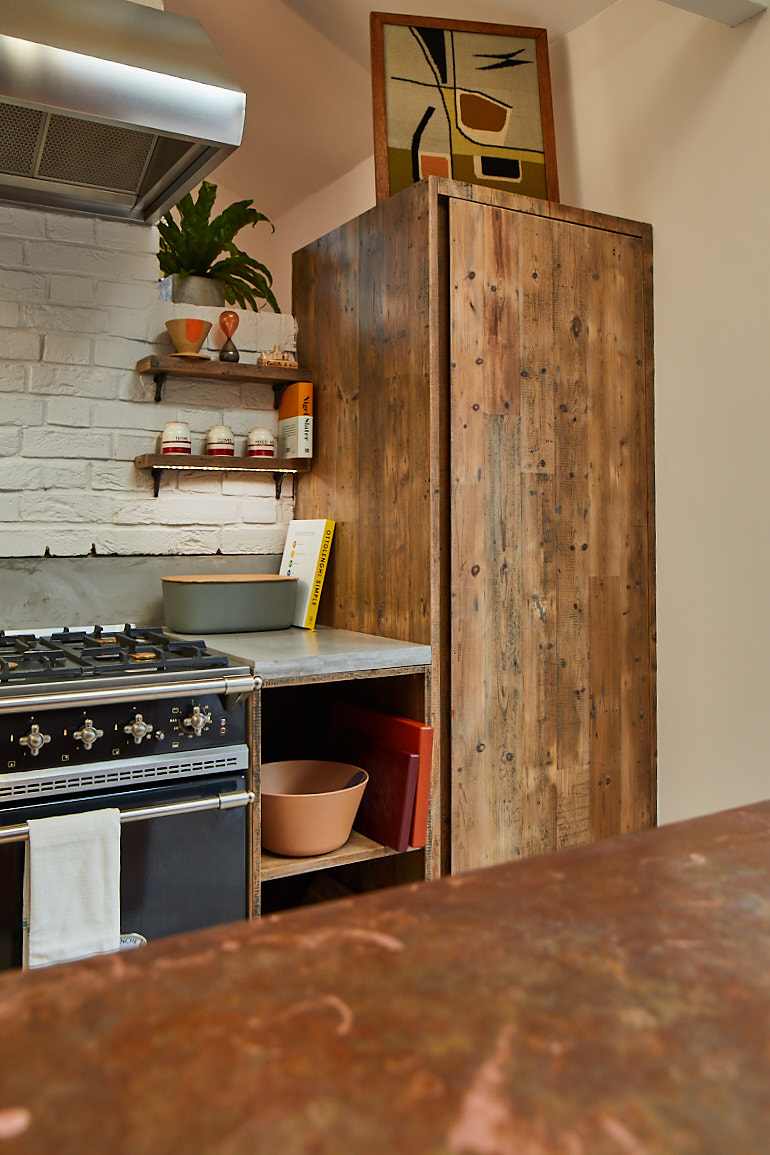 Reclaimed larder unit in bespoke kitchen