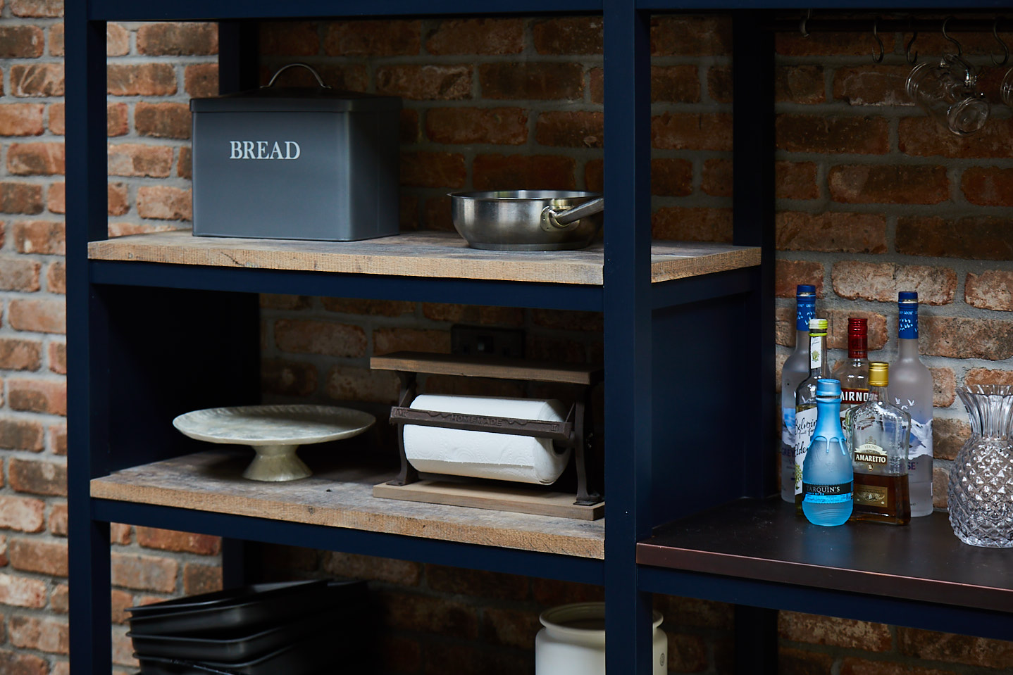 Items on industrial open shelving unit painted basalt by Little Greene