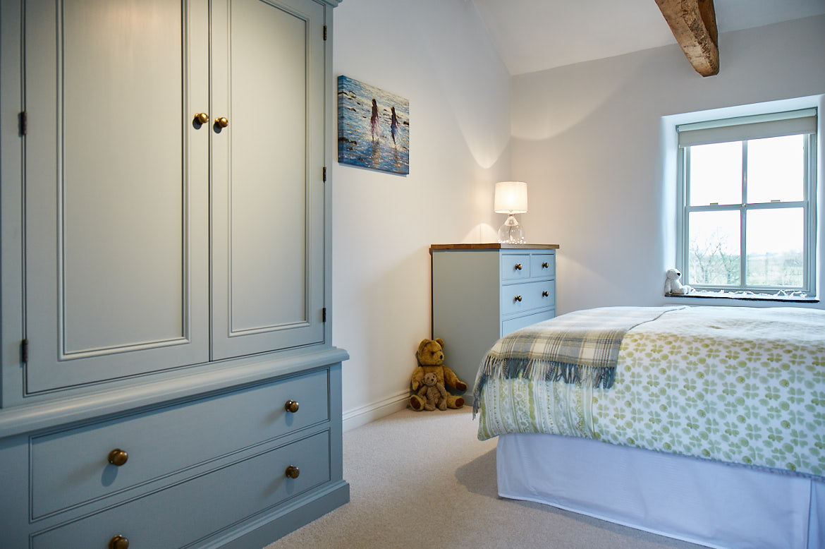 Blue wardrobe and chest of drawers