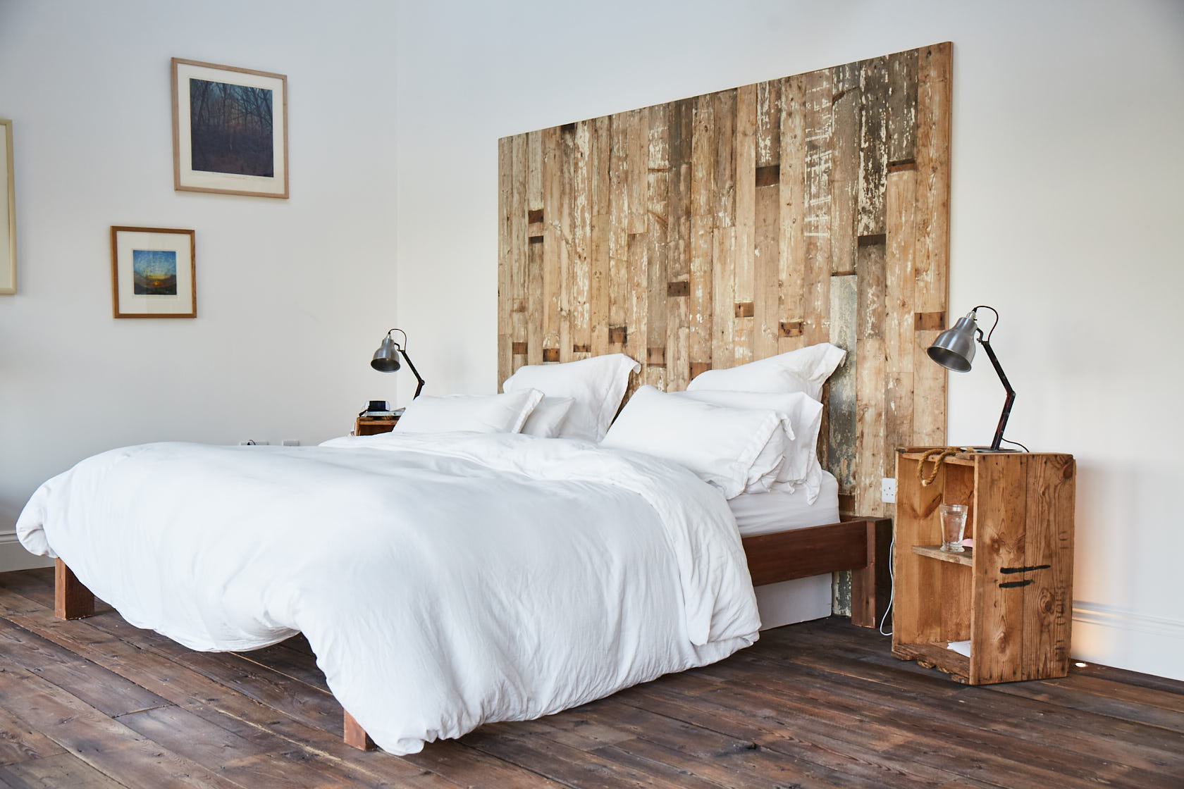 Double bed with reclaimed rustic headboard