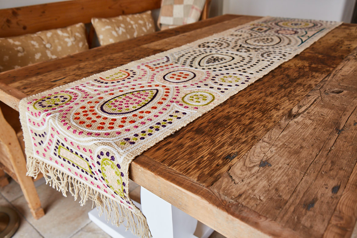 Reclaimed table top with colourful runner