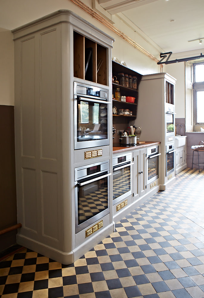 Traditional painted cabinets with integrated ovens