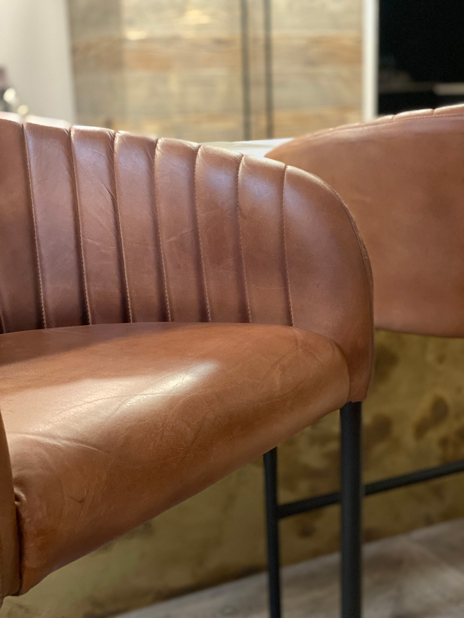 Brown leather bar stool