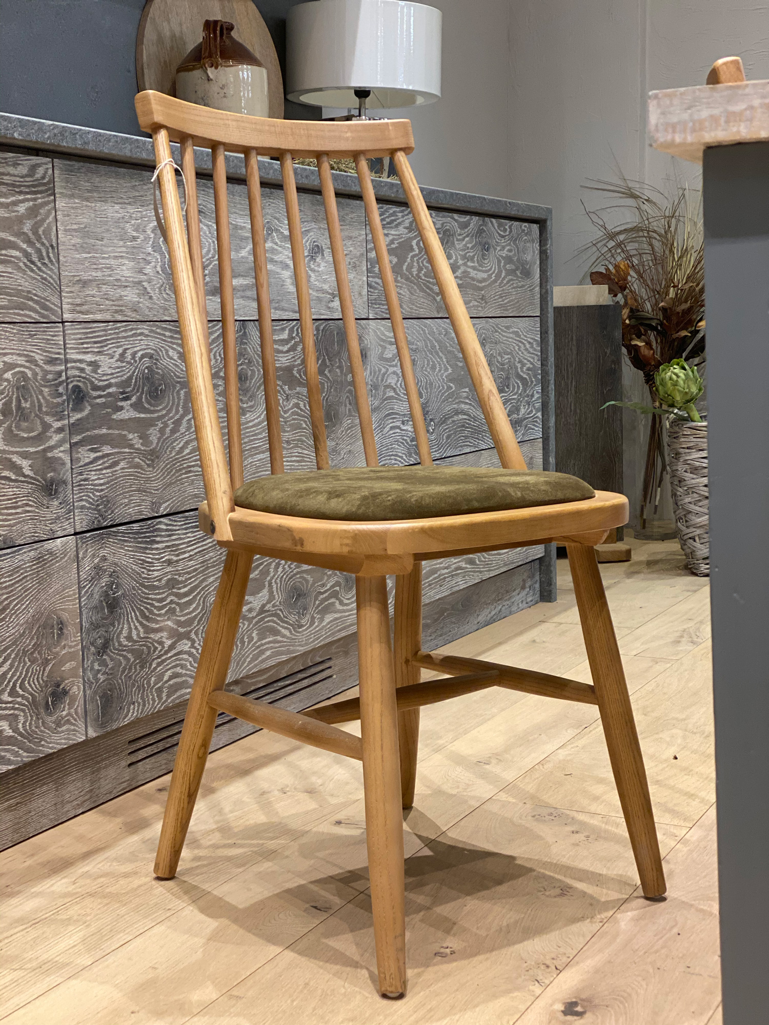 Oak chair with green felt seat