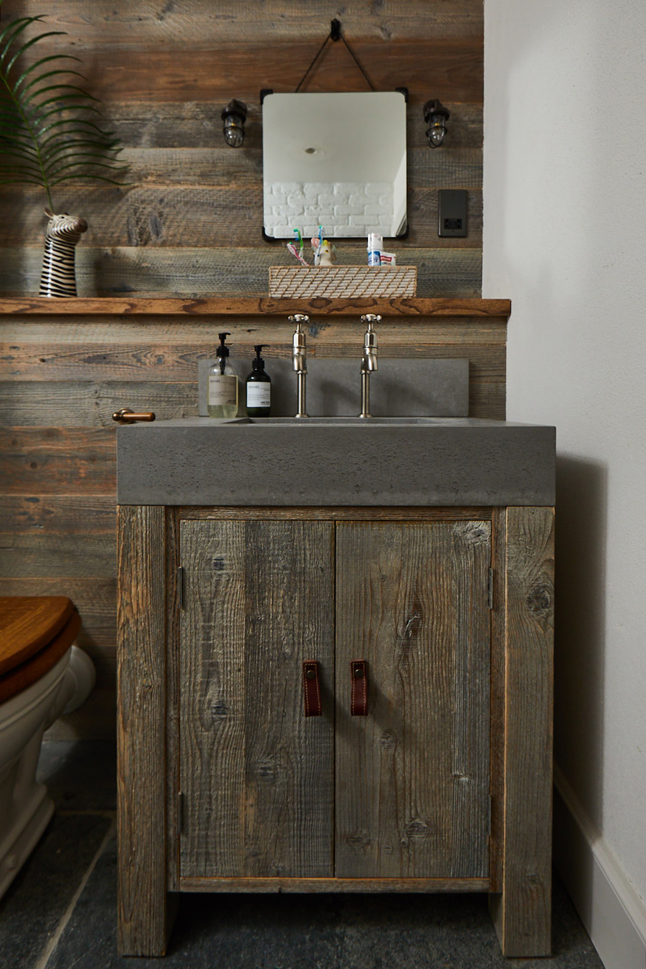 Reclaimed pine vanity unit with solid grey concrete sink