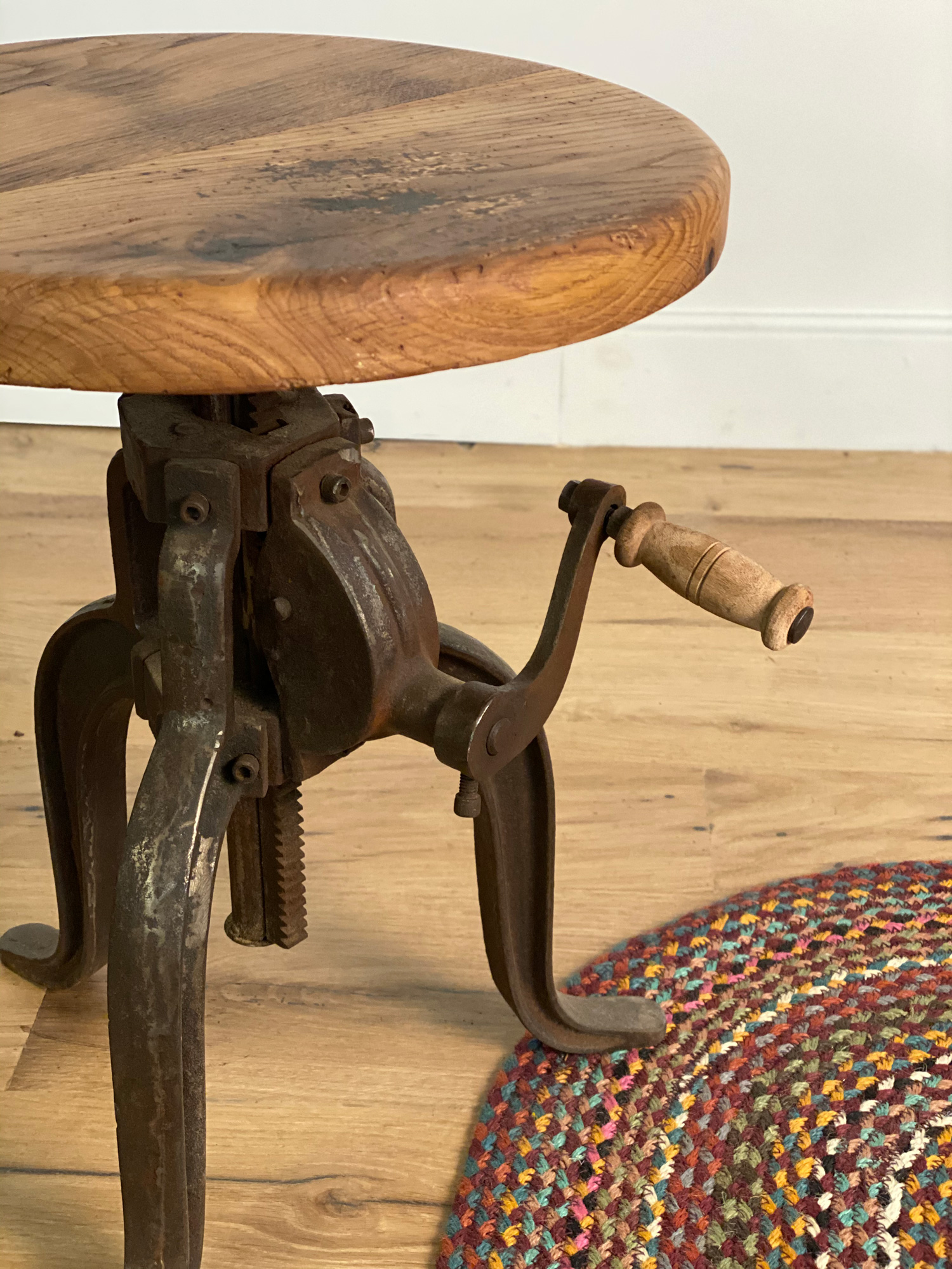 Industrial side table made from cast iron and solid oak