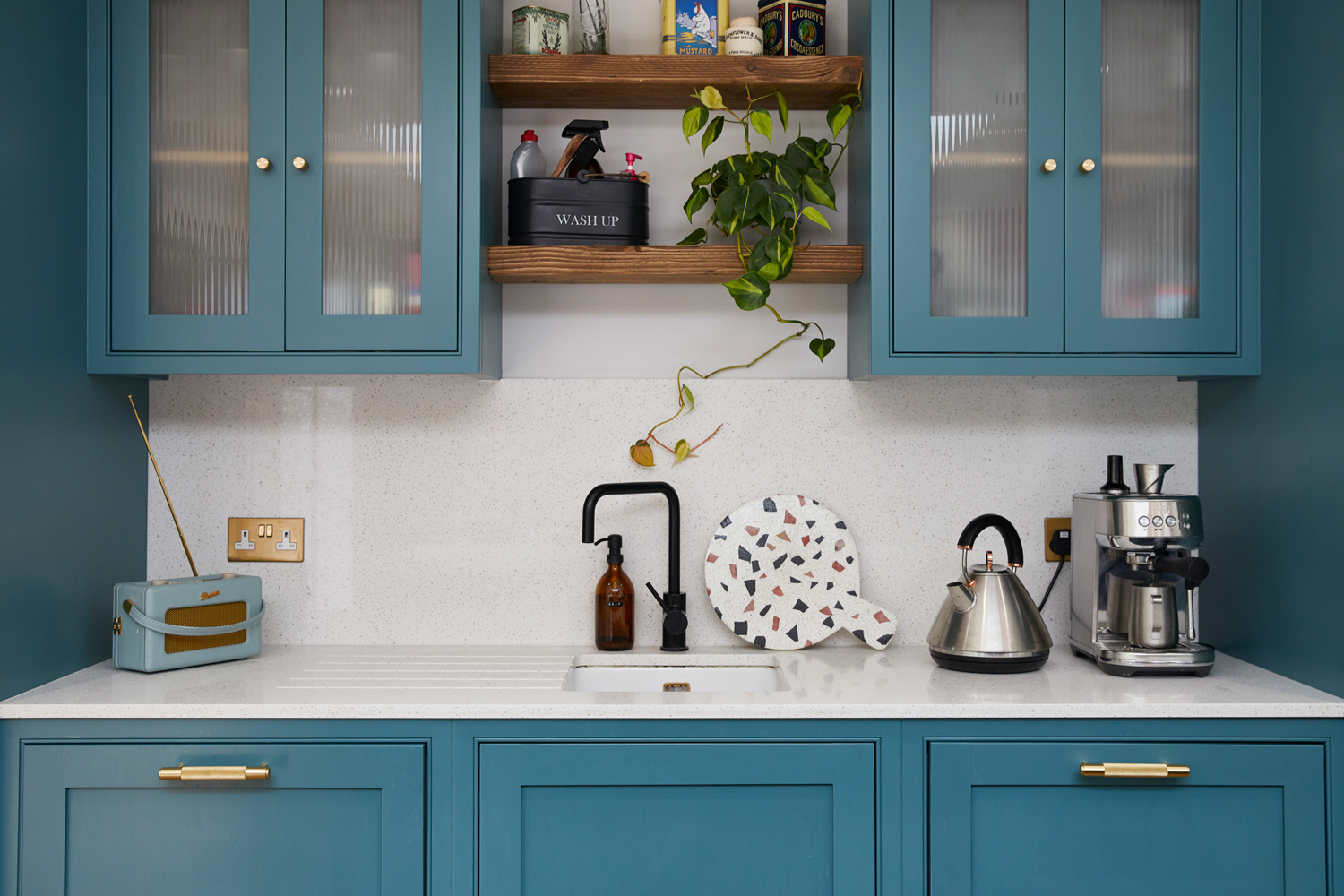 Bespoke sink run painted in Little Greene Tea with Florence and finished with brass hardware