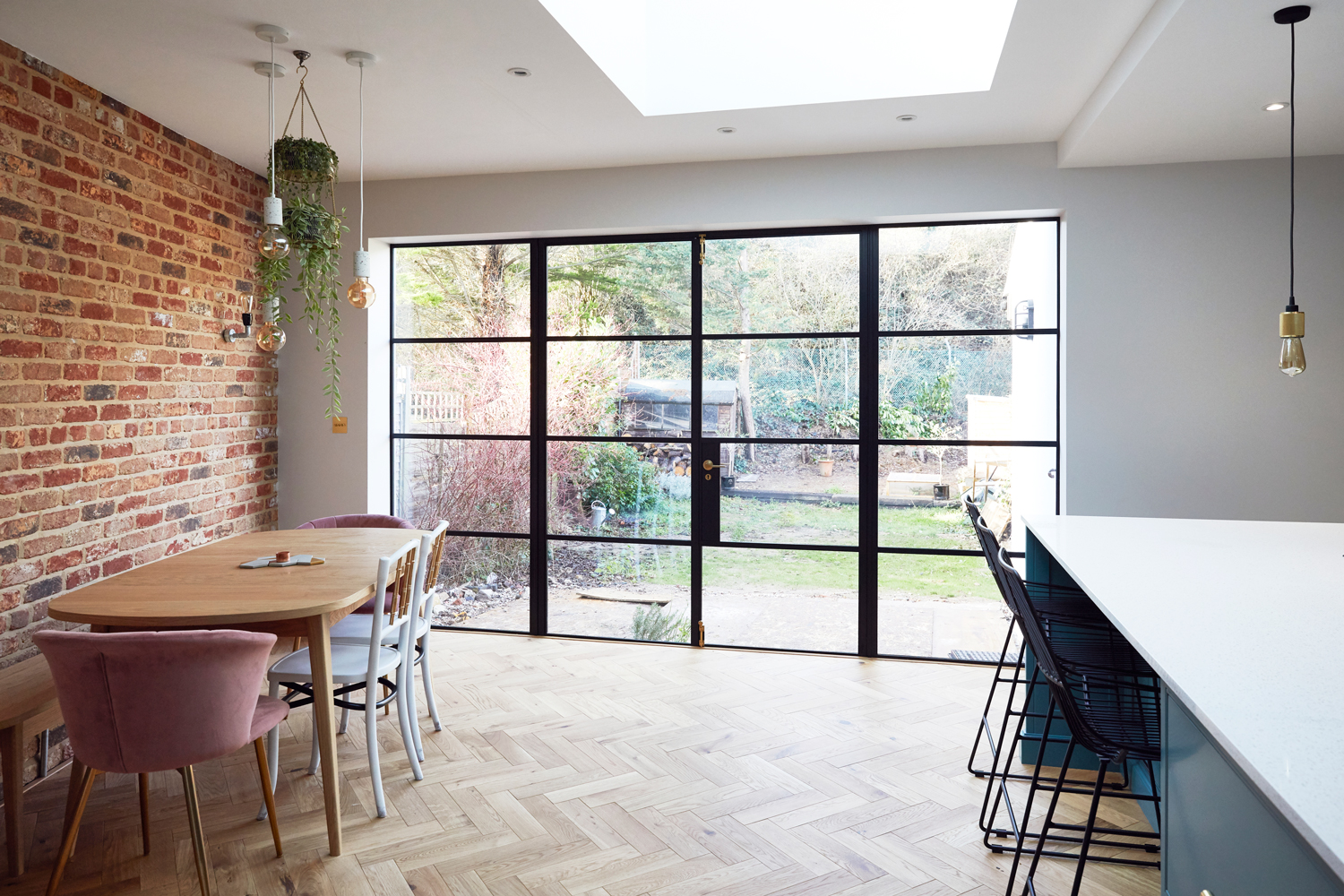 Crittall style patio doors with parquet oak flooring