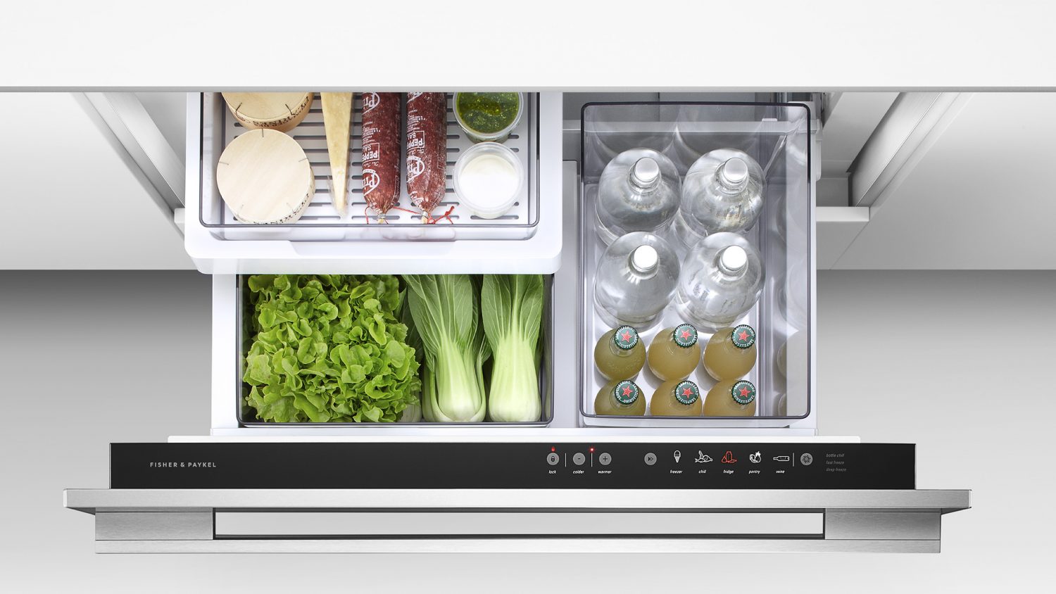 Fisher Paykel CoolDrawer open with fresh vegetables and drinks