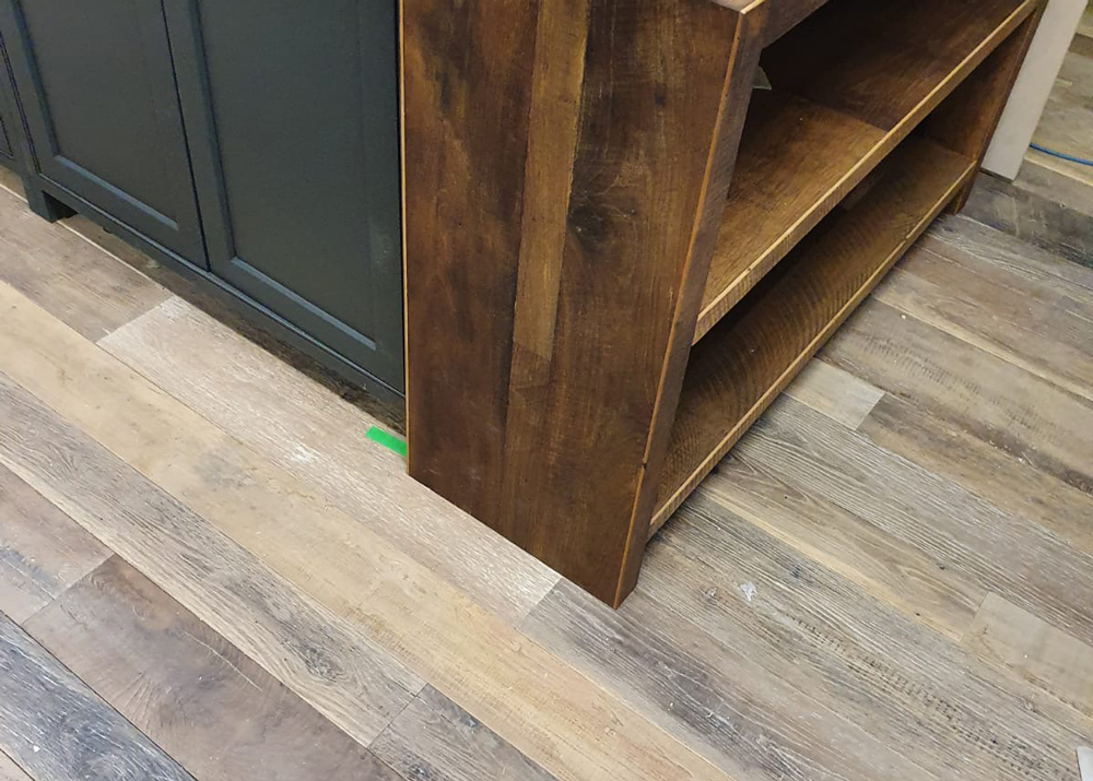 Reclaimed bookcase on bespoke kitchen island