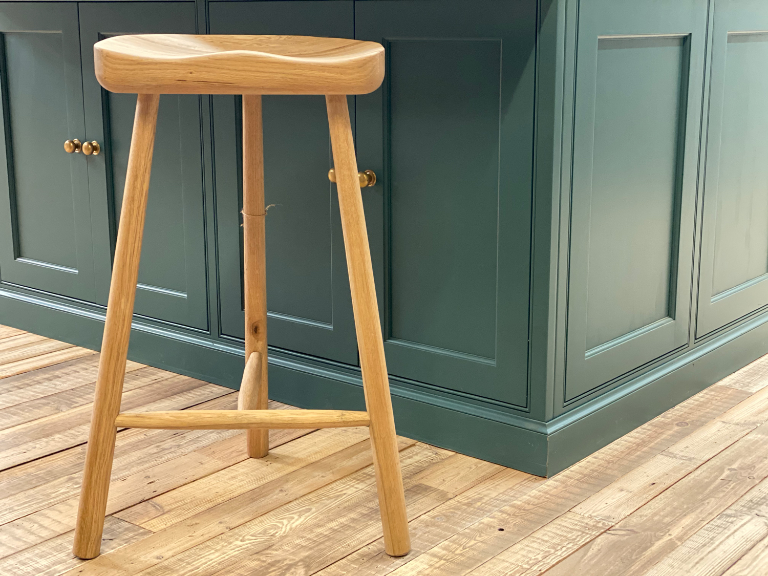 Clean oak three legged bar stool