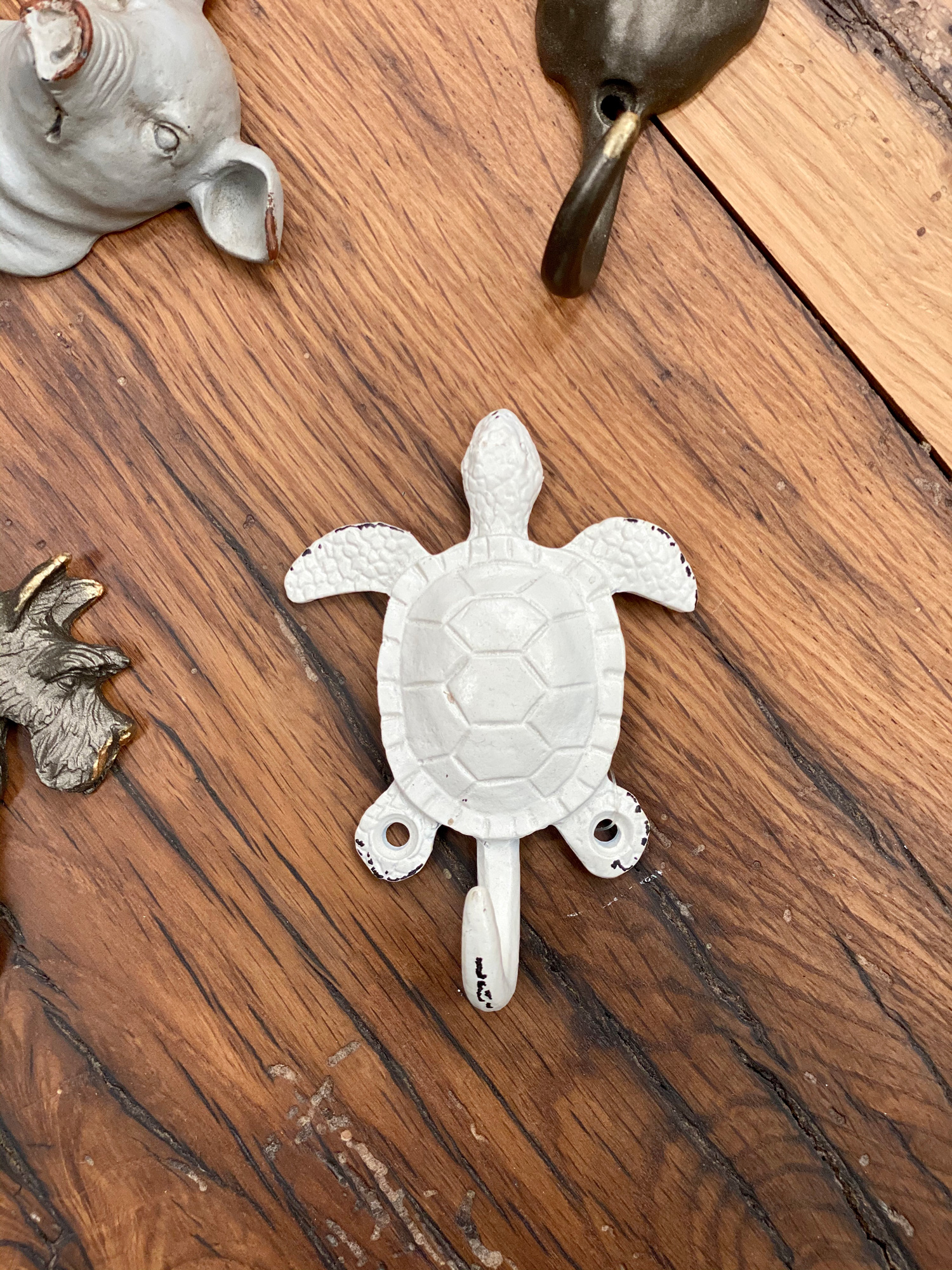 Tortoise white metal coat hook