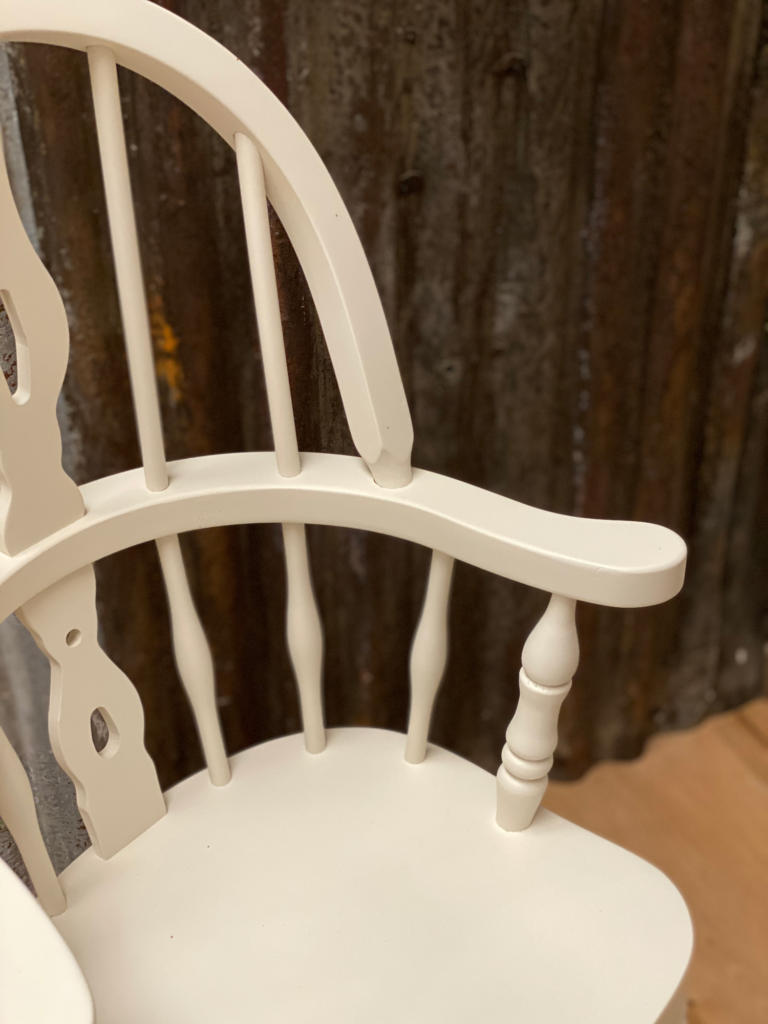 arm detail on white painted childs windsor chair