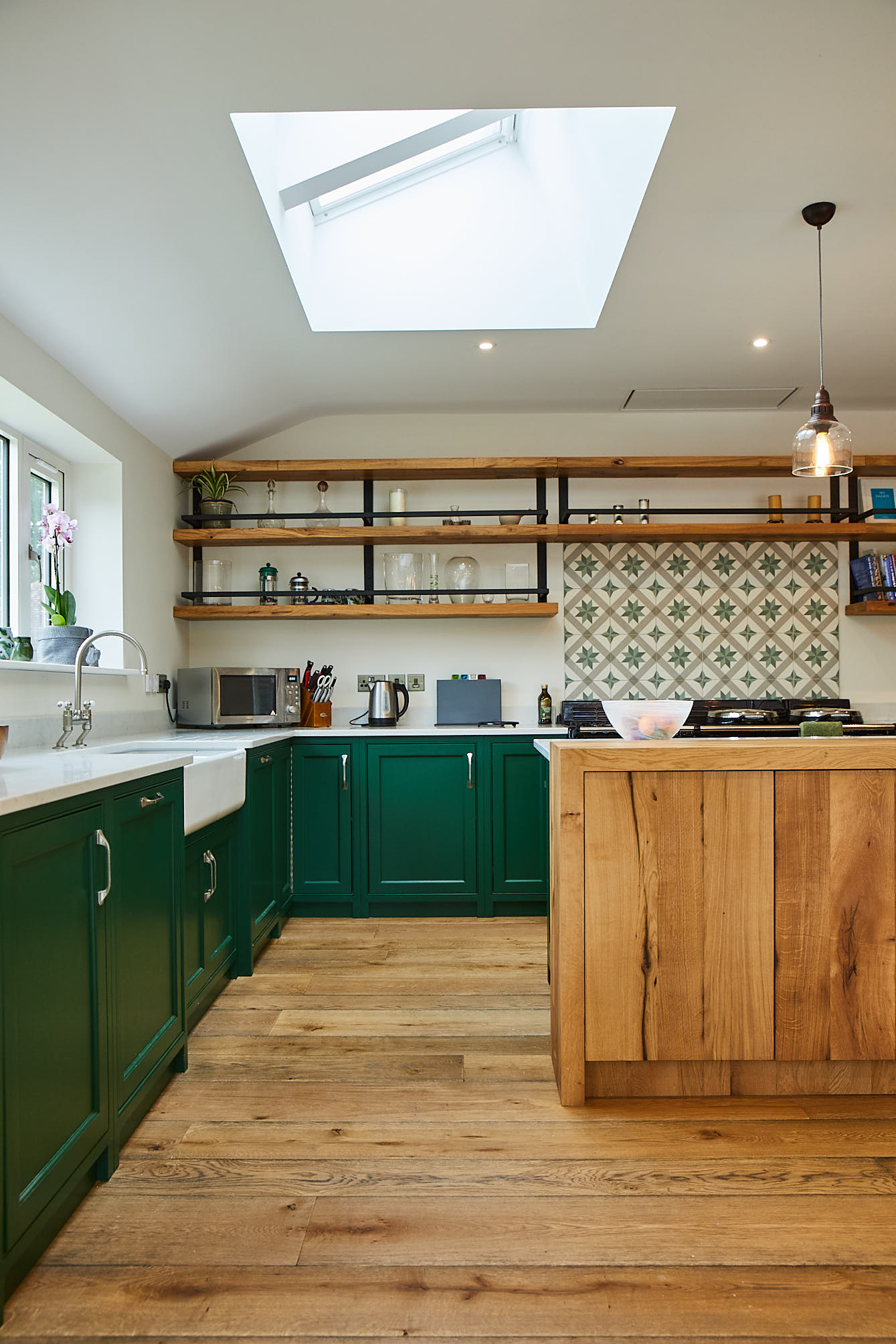 Puck Little Greene kitchen cabinets with oak open shelves and Belfast ceramic sink