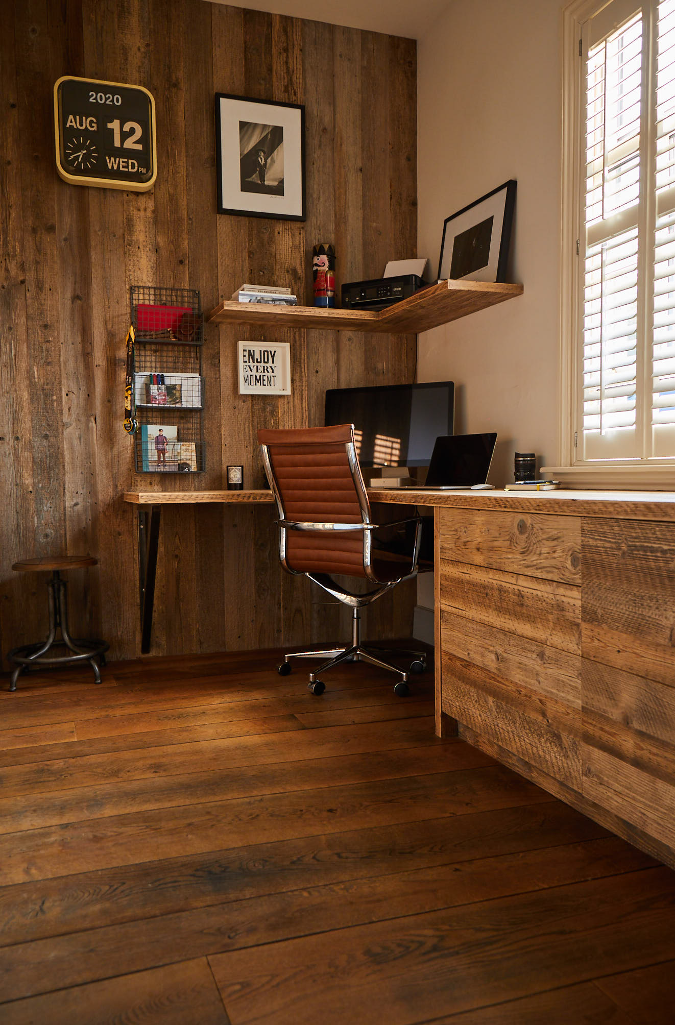 Home office with reclaimed cladding and industrial chair