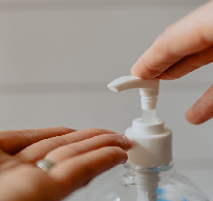 Lady Using Soap Pump Washing Hands