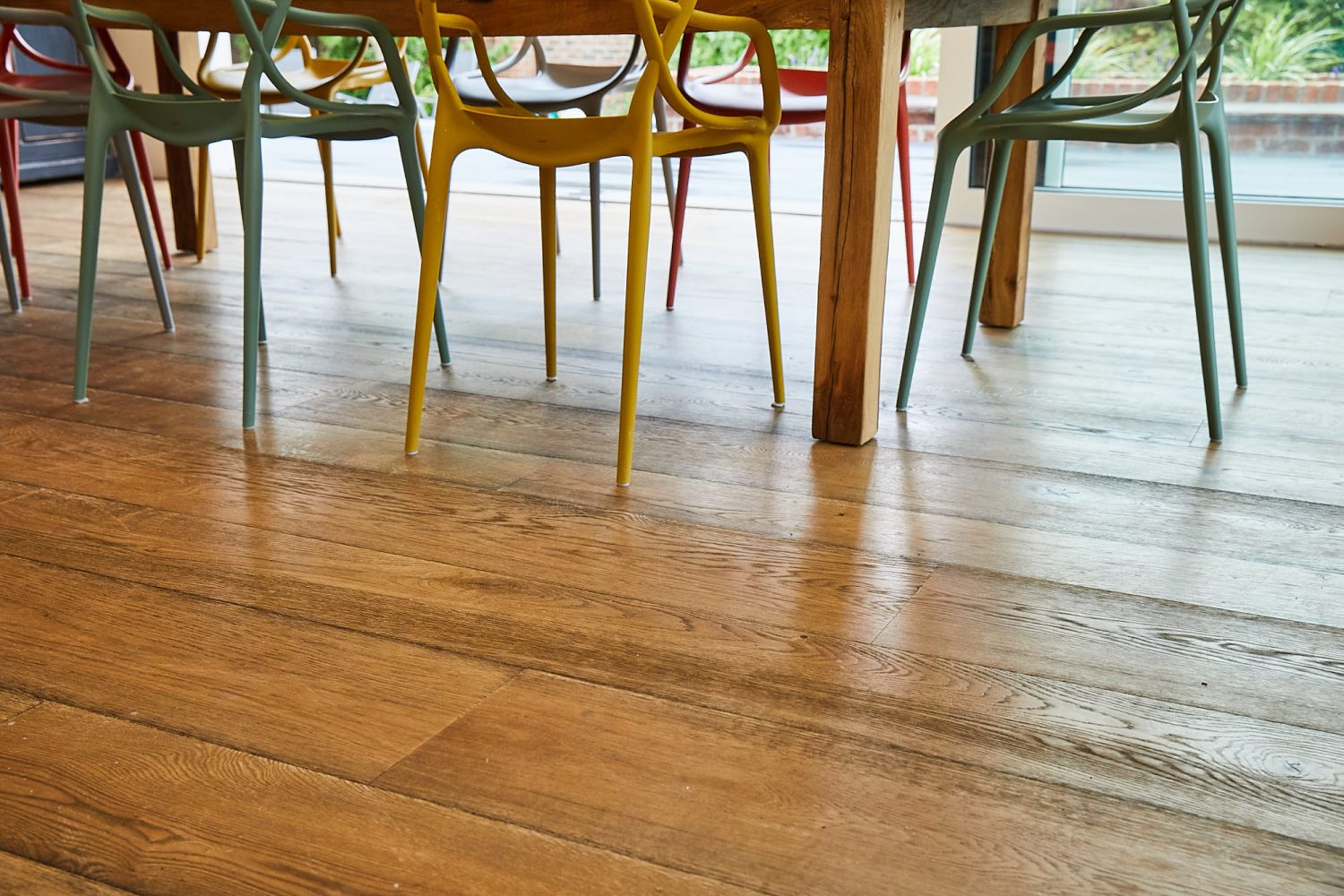 Rustic oak flooring in dining area