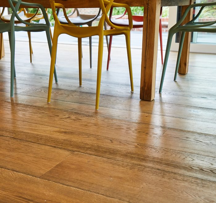 Rustic oak flooring in dining area