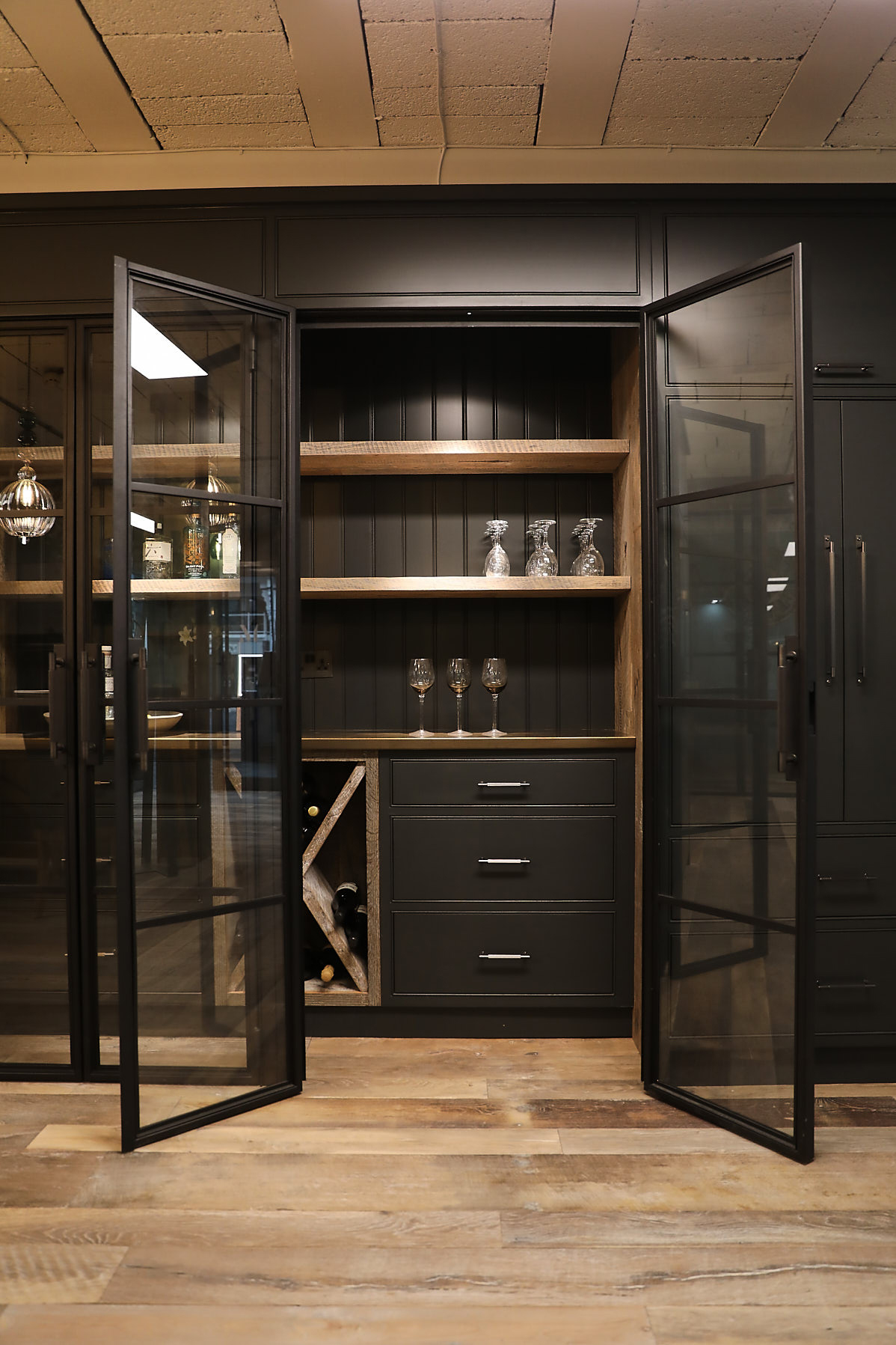 Bespoke tall bar unit with walk in wine racks