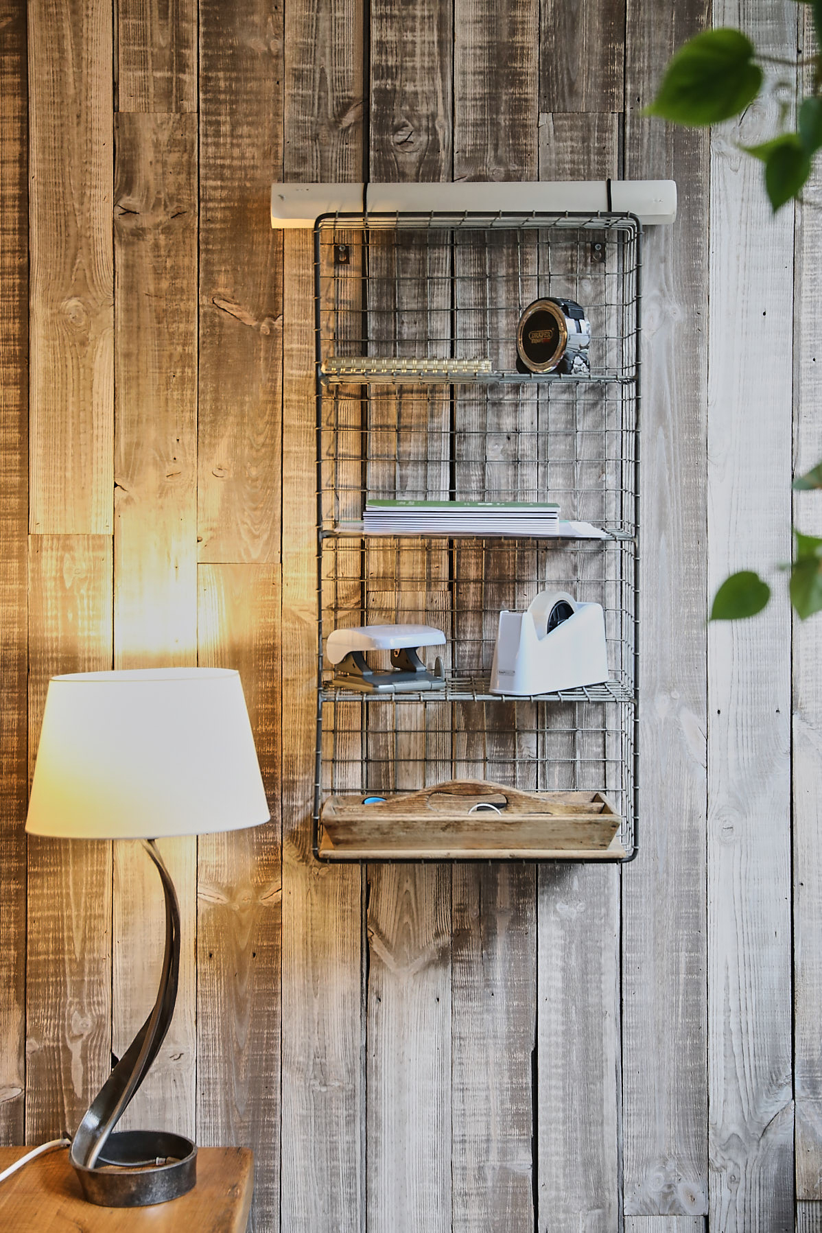 Rustic wall cladding with wire shelf