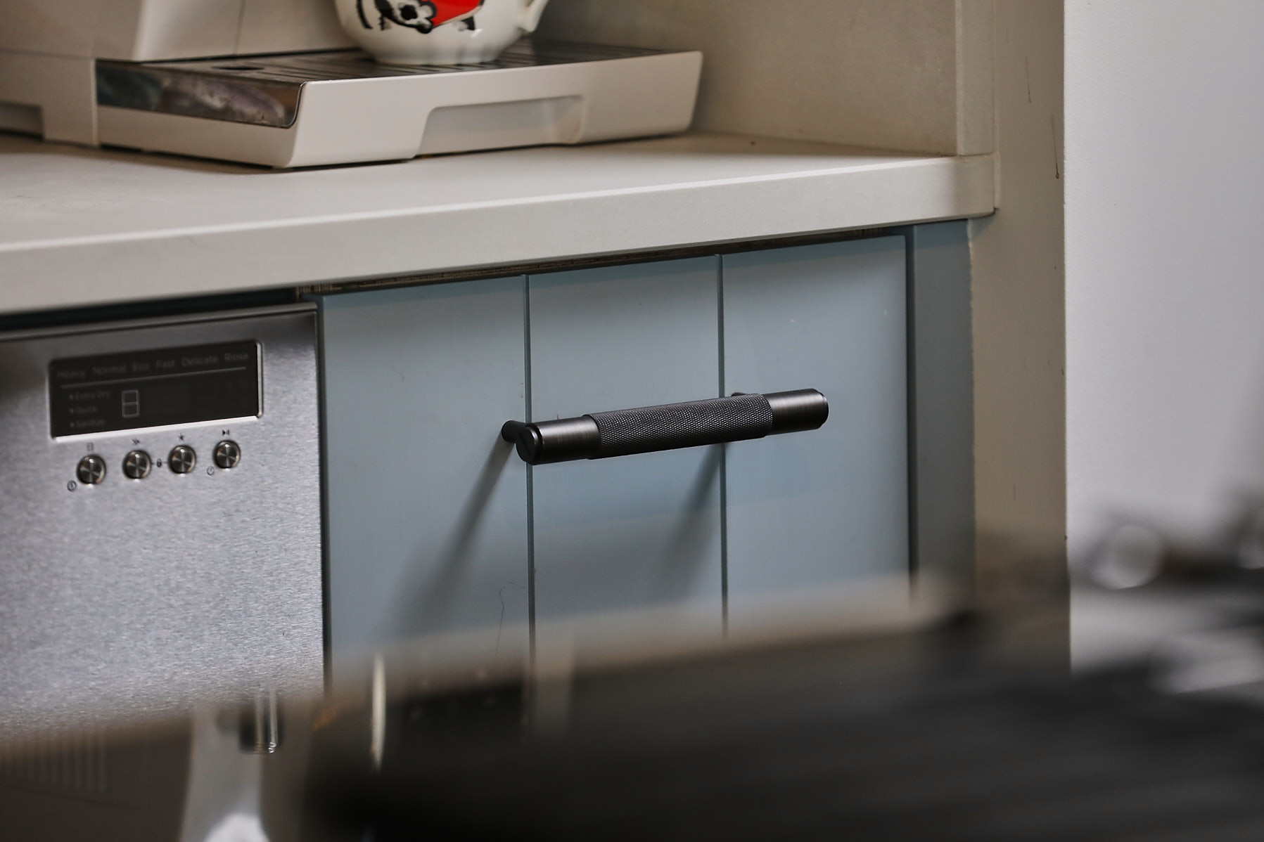 Buster and Punch bar pull on kitchen cabinet