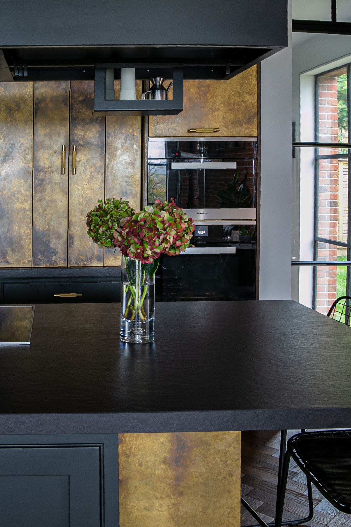 Flowers on bespoke kitchen island