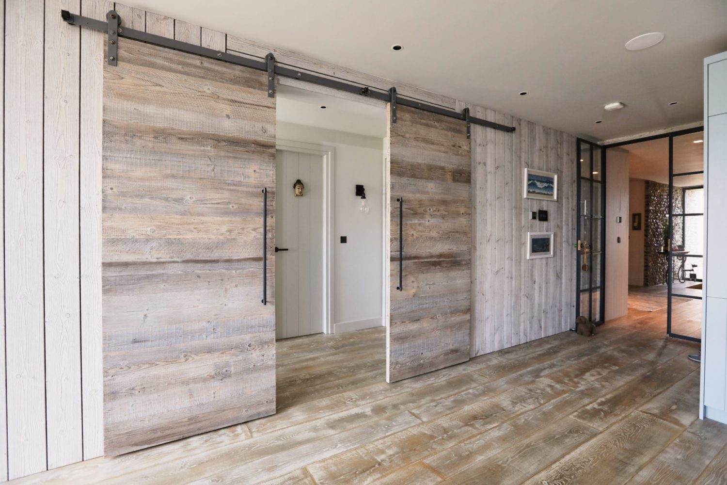 Barn sliding door with metal rail