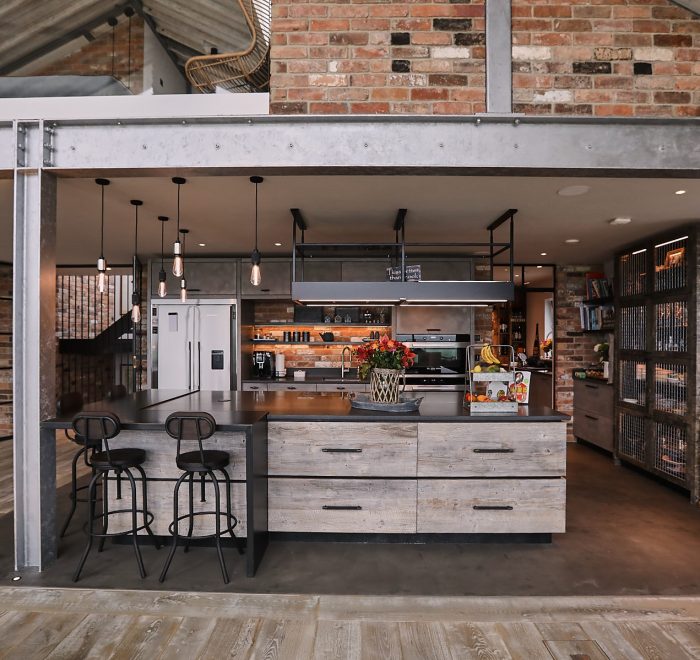 Large open plan bespoke kitchen with vaulted ceiling