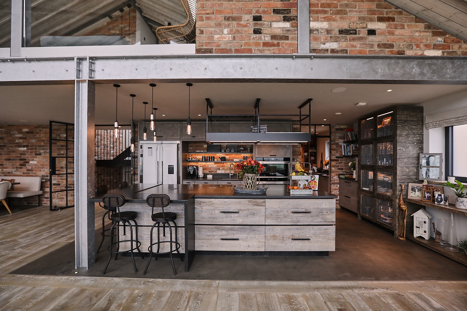 Large open plan bespoke kitchen with vaulted ceiling