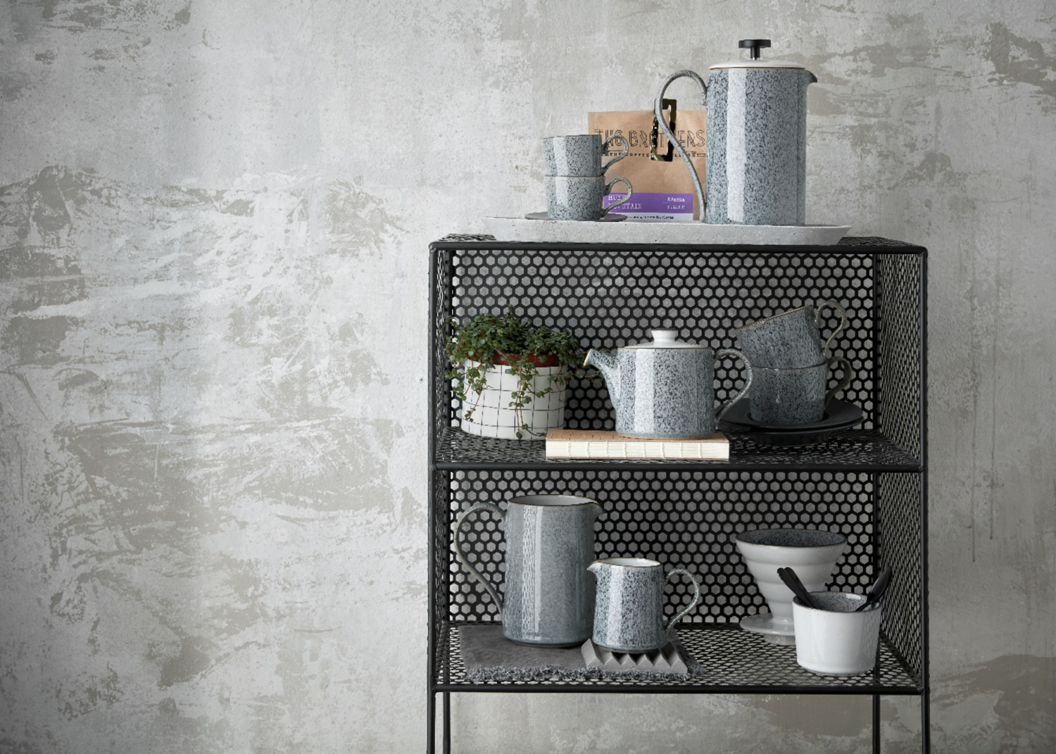 Deby ceramics on metal shelves