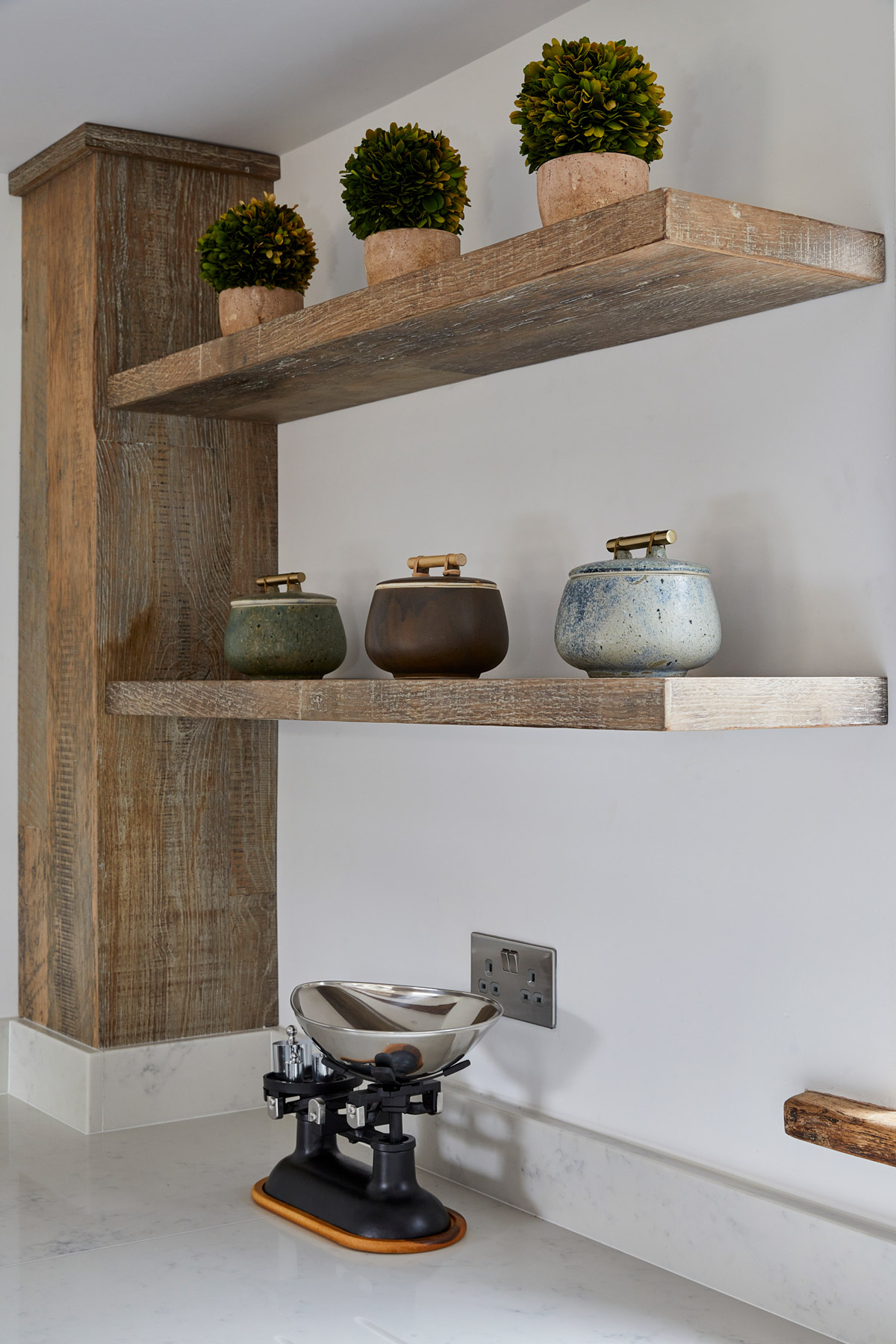 Chunky rustic oak open shelves with weighing scales