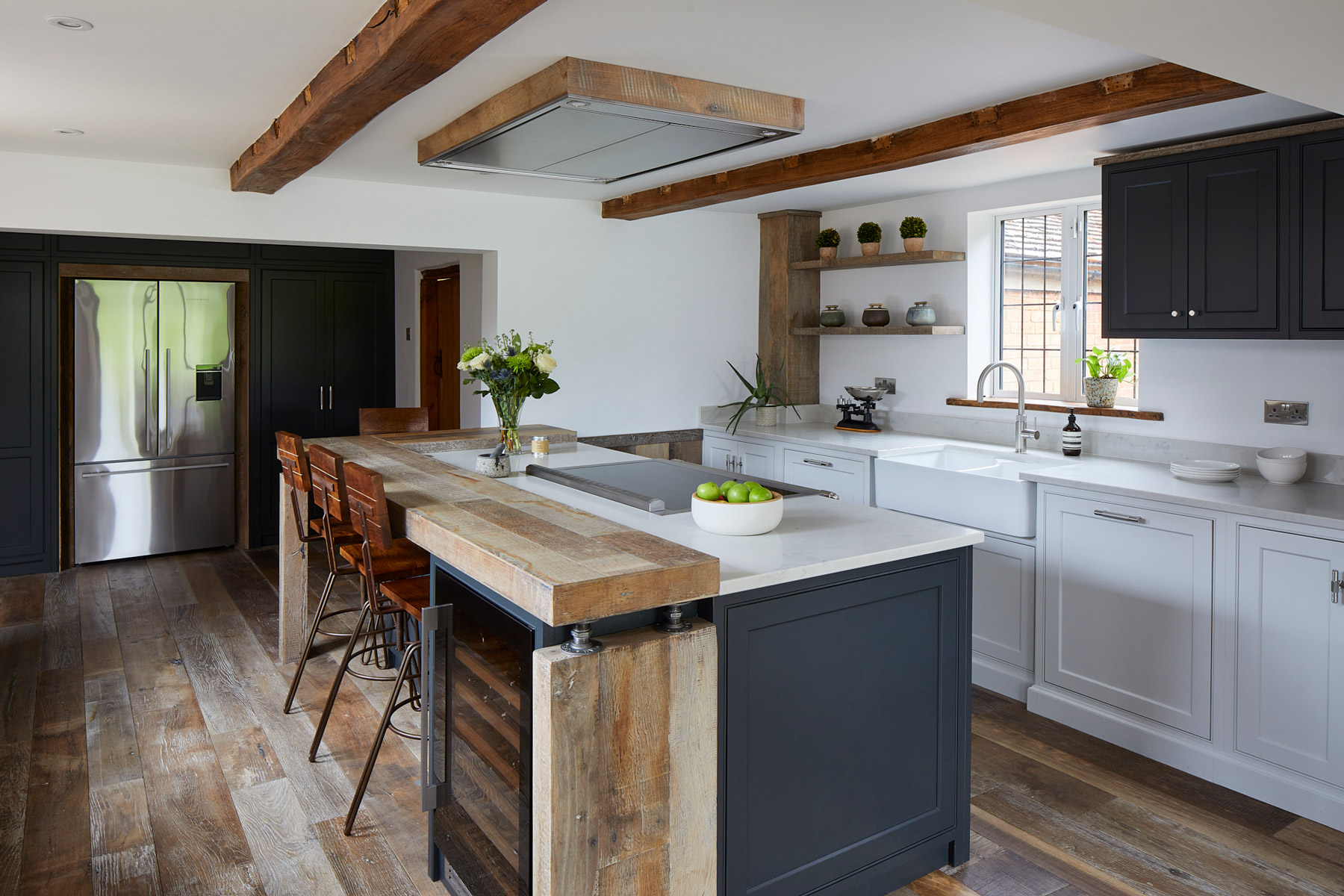 Wine cooler integrated in to bespoke kitchen cabinets