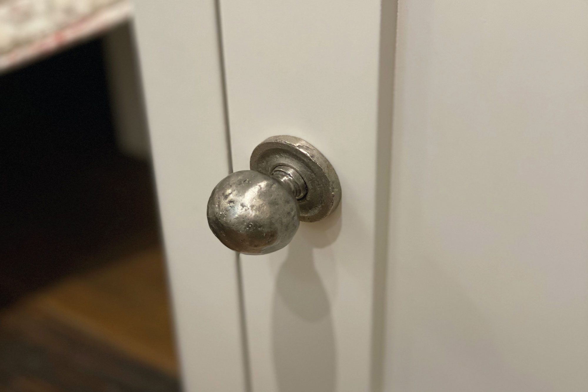 Hammered ball knob on bedside table