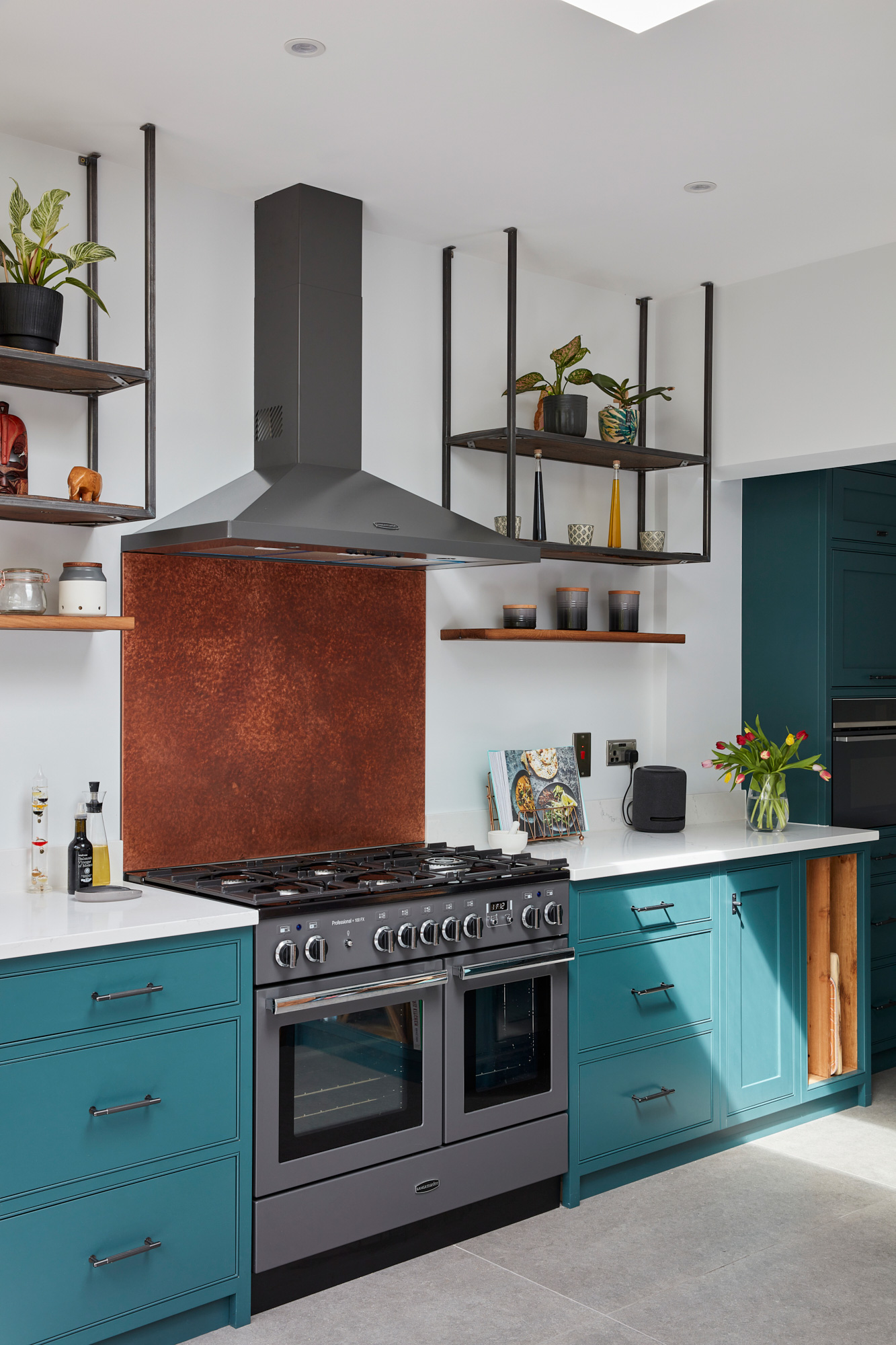 Copper backsplash in bespoke painted industrial kitchen