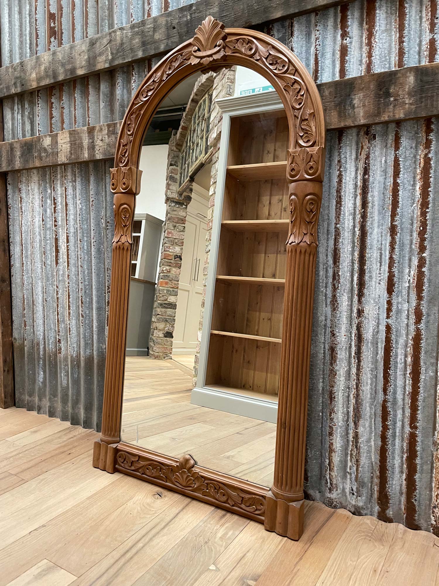 Mirror with carved pine frame