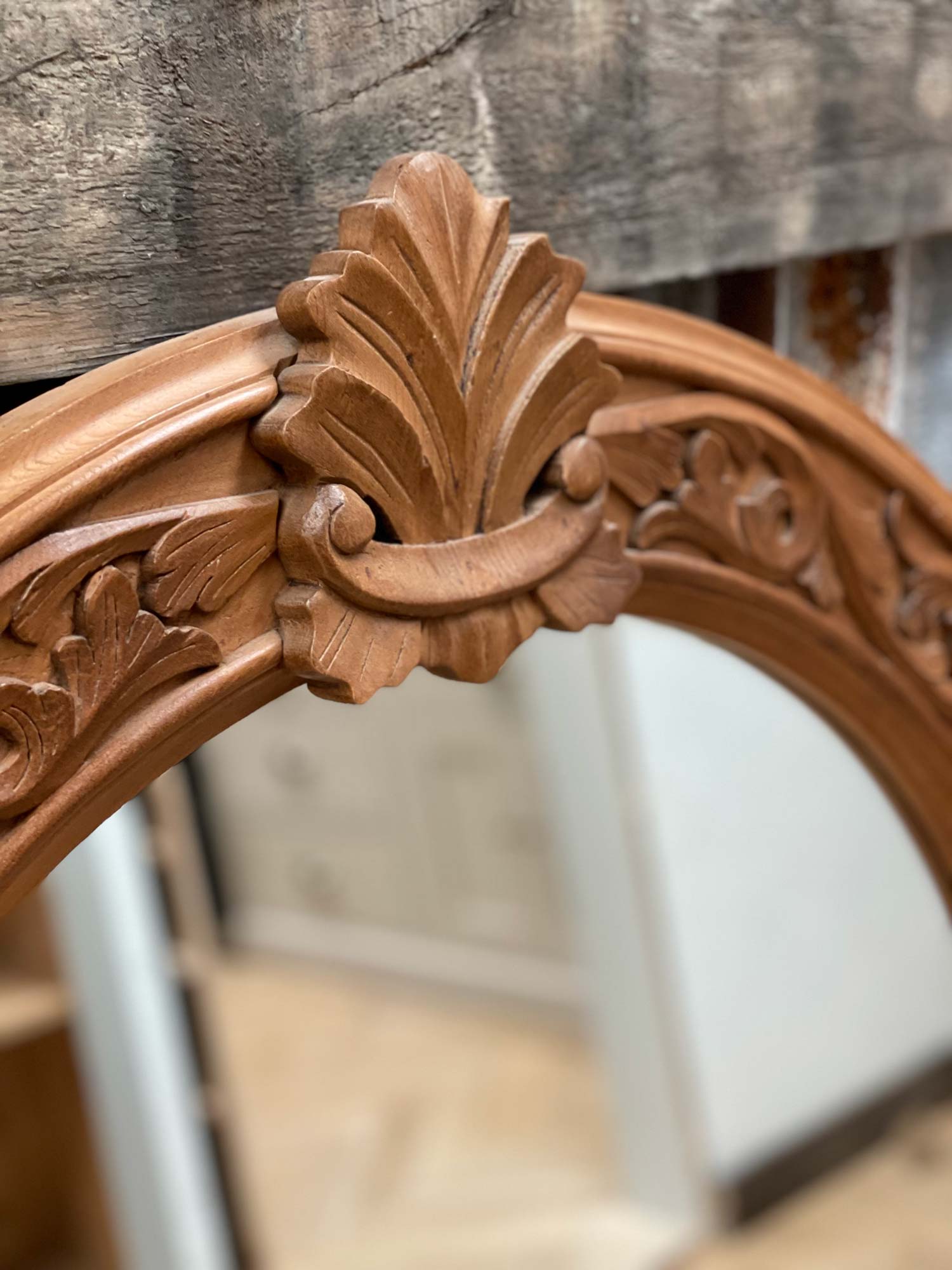 Carved detail on antique mirror