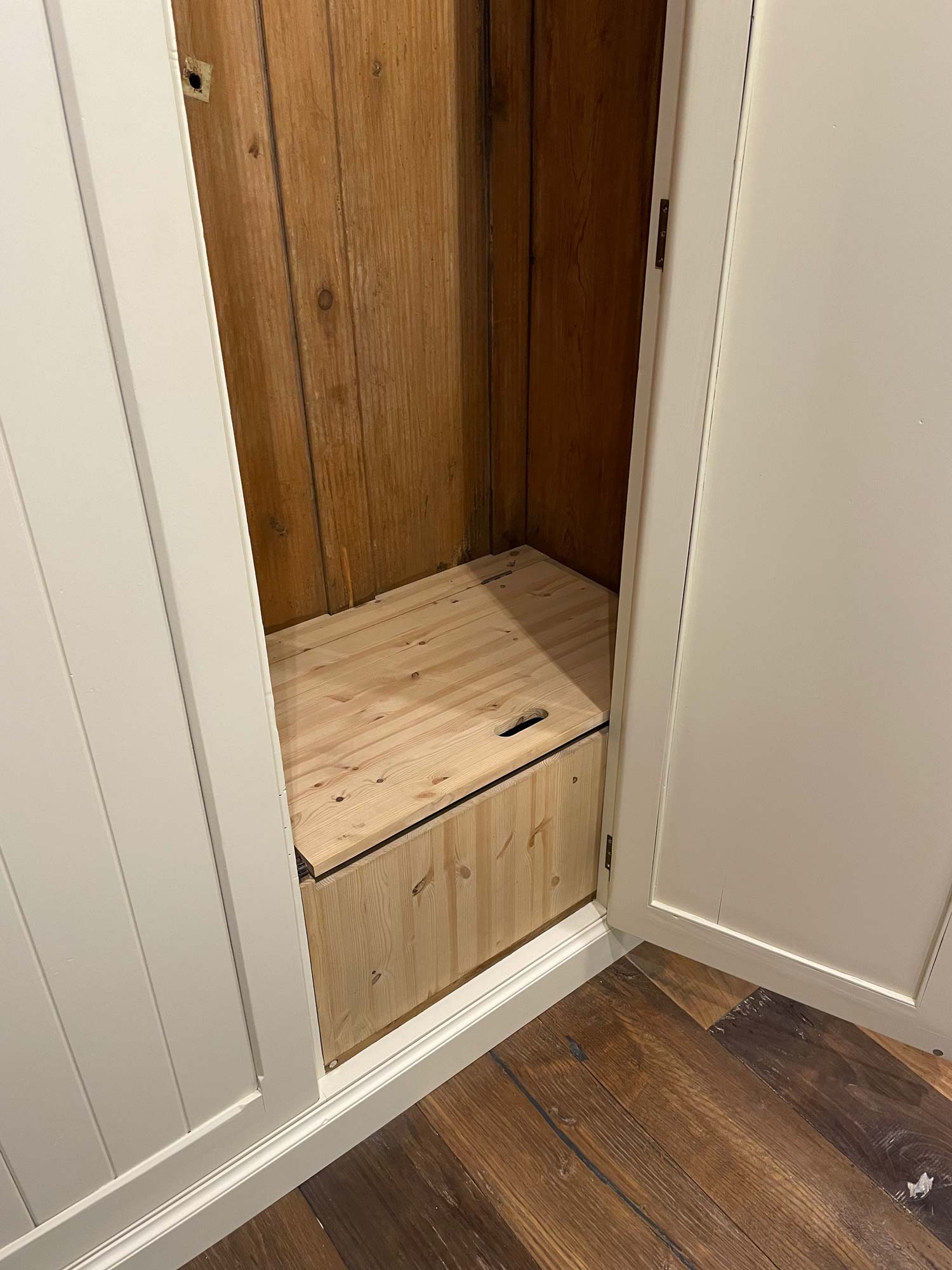 Pine storage chest inside wardrobe