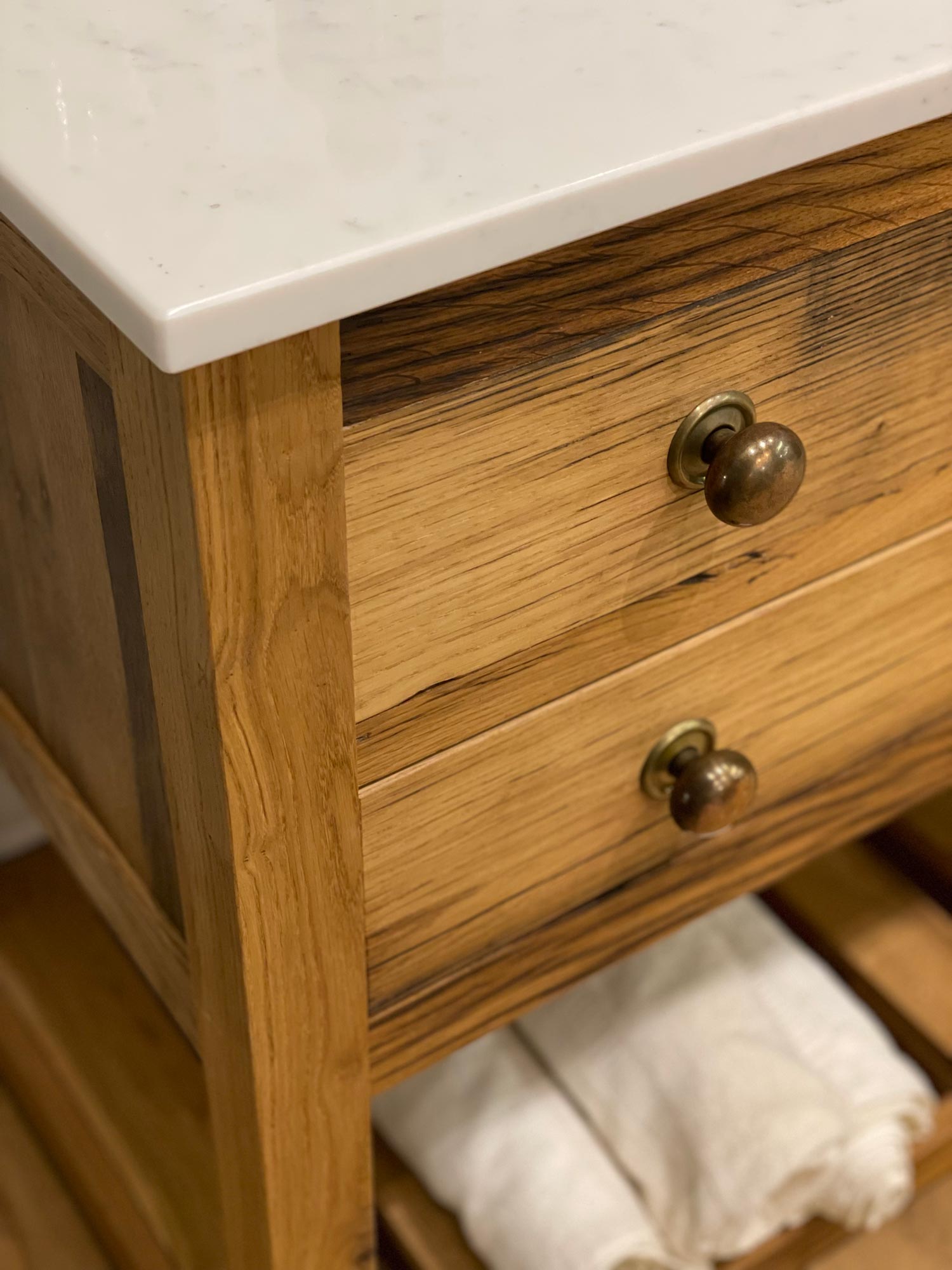 Burnt brass knobs on vanity unit