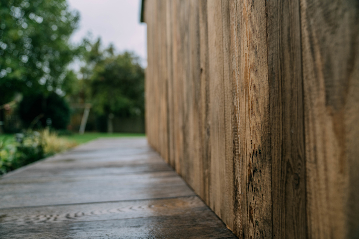 Outside garden room reclaimed wall