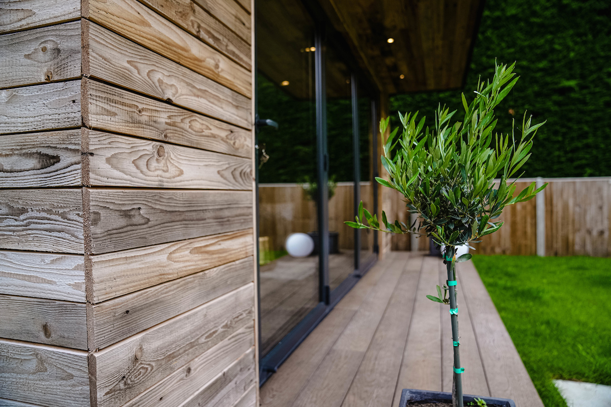 Garden room reclaimed cladding