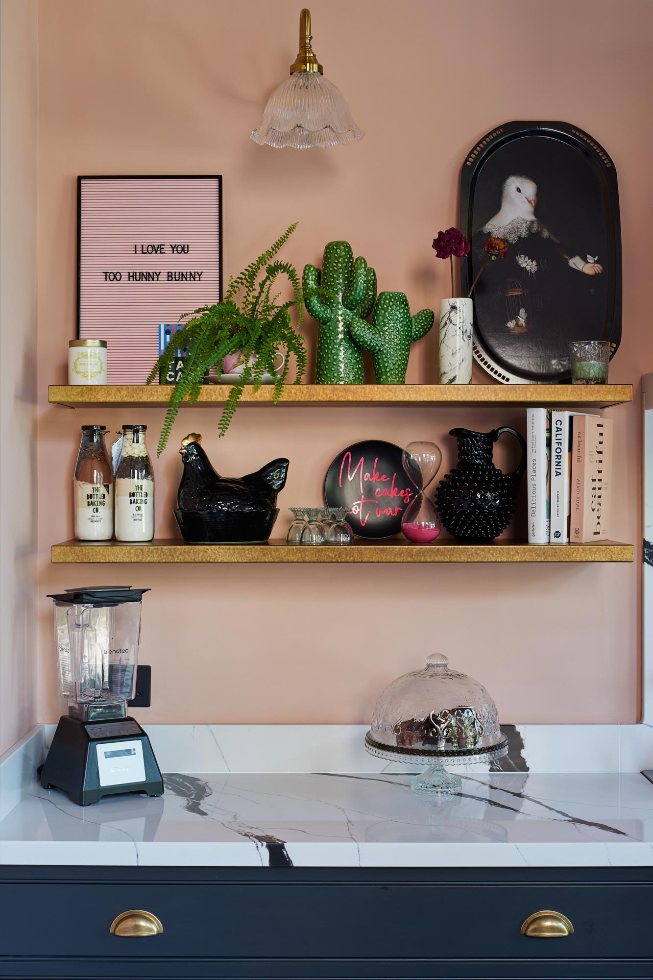 Floating brass kitchen shelves