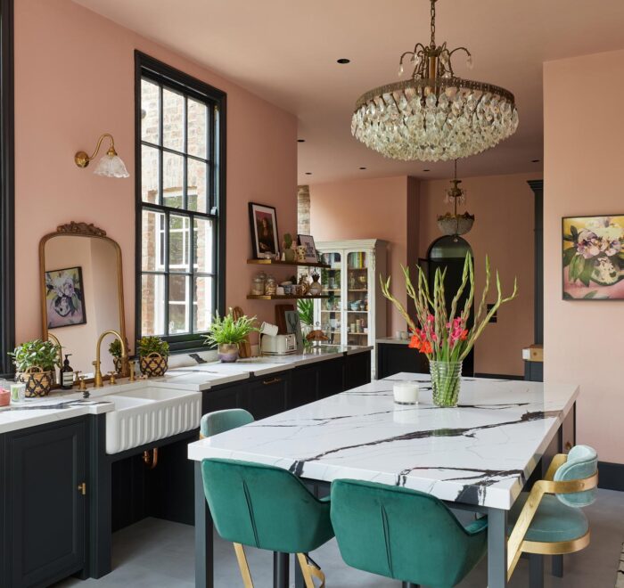 Bespoke kitchen island with green bar stools