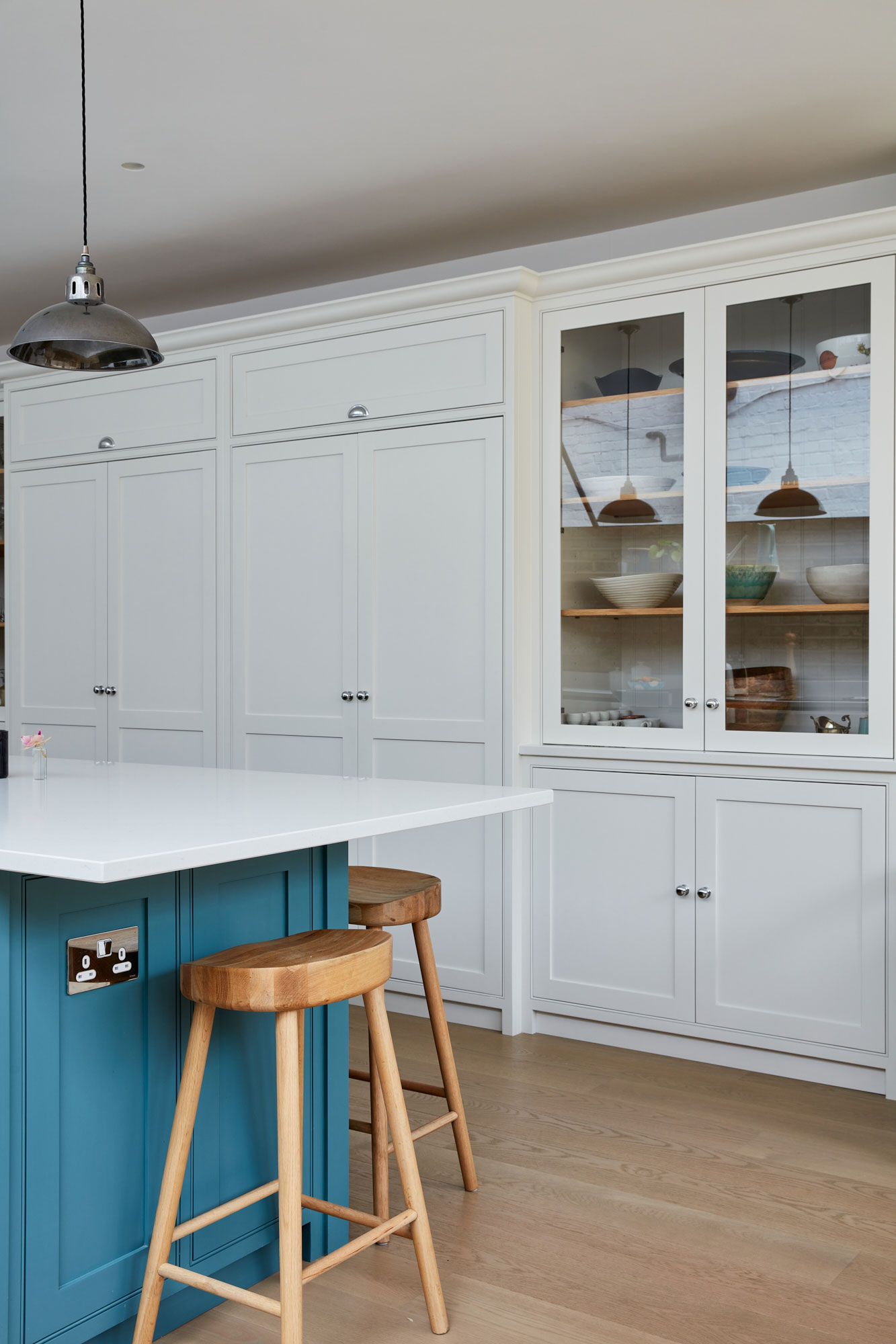 Tall integrated painted kitchen cabinets