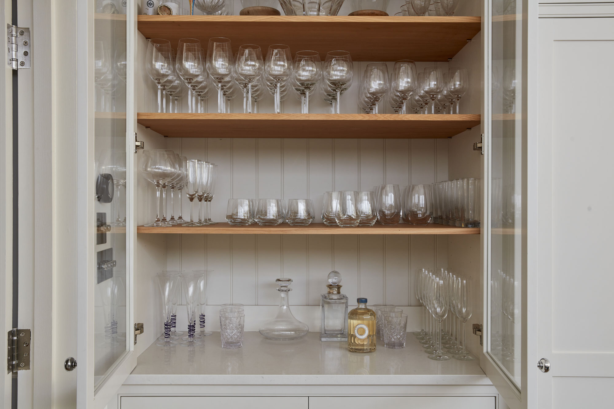 Glasses in painted pantry cabinet