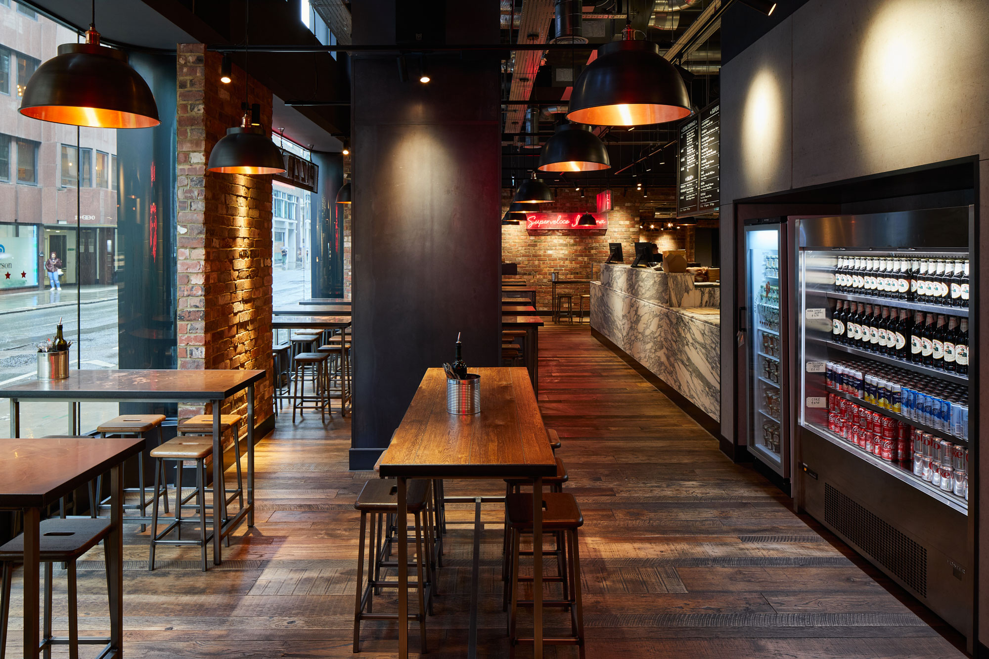 Commercial wood flooring for Pizza Union by The Main Company